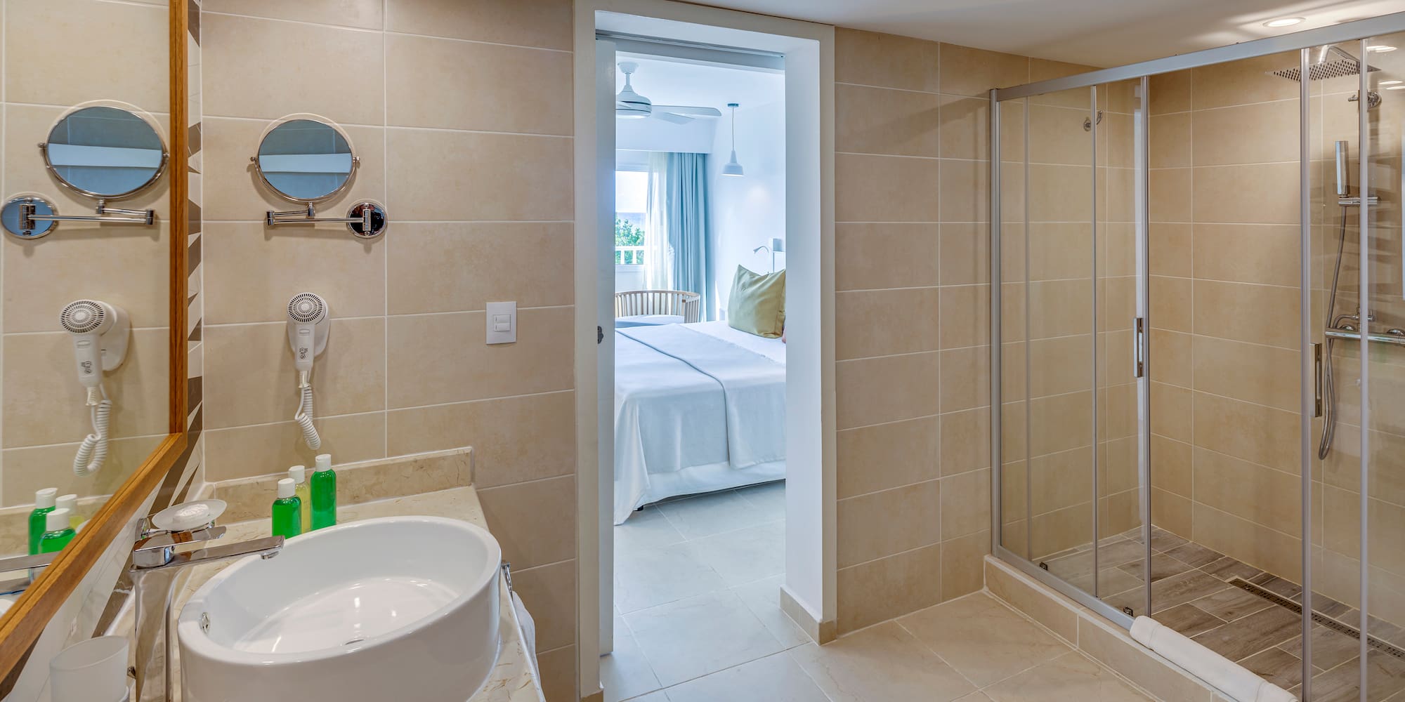 a bathroom with a shower and sink