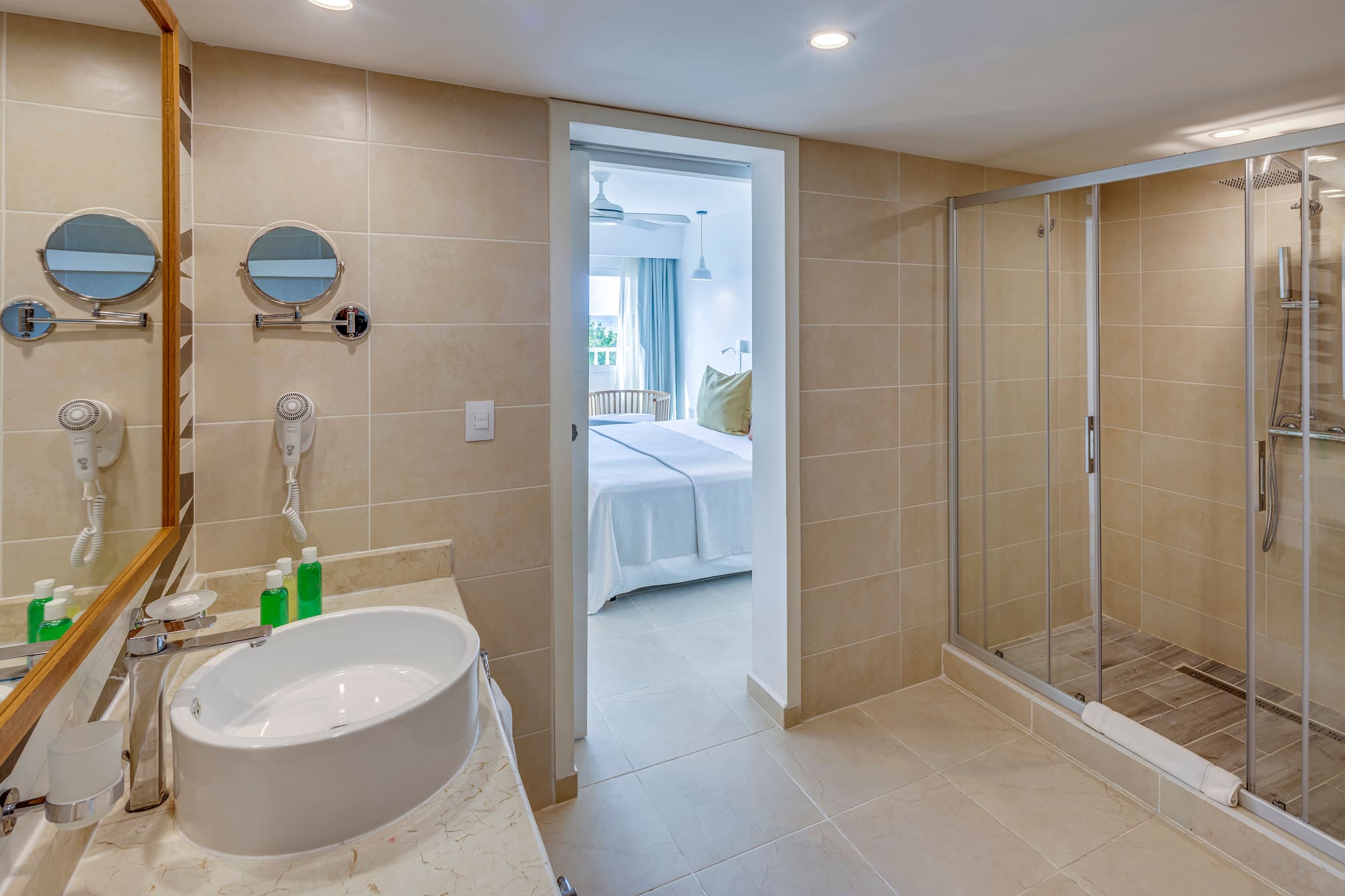 a bathroom with a shower and sink