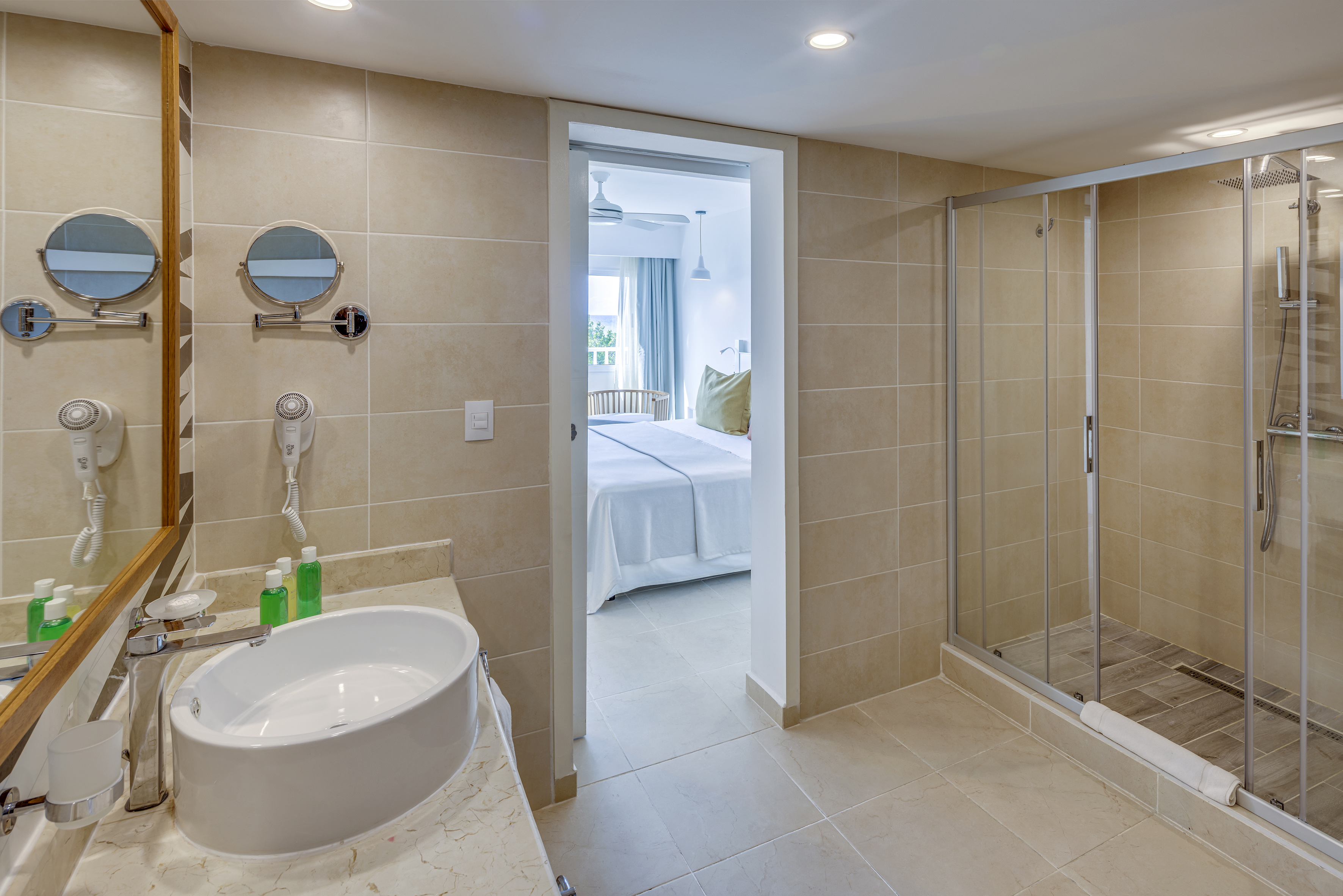 a bathroom with a shower and sink