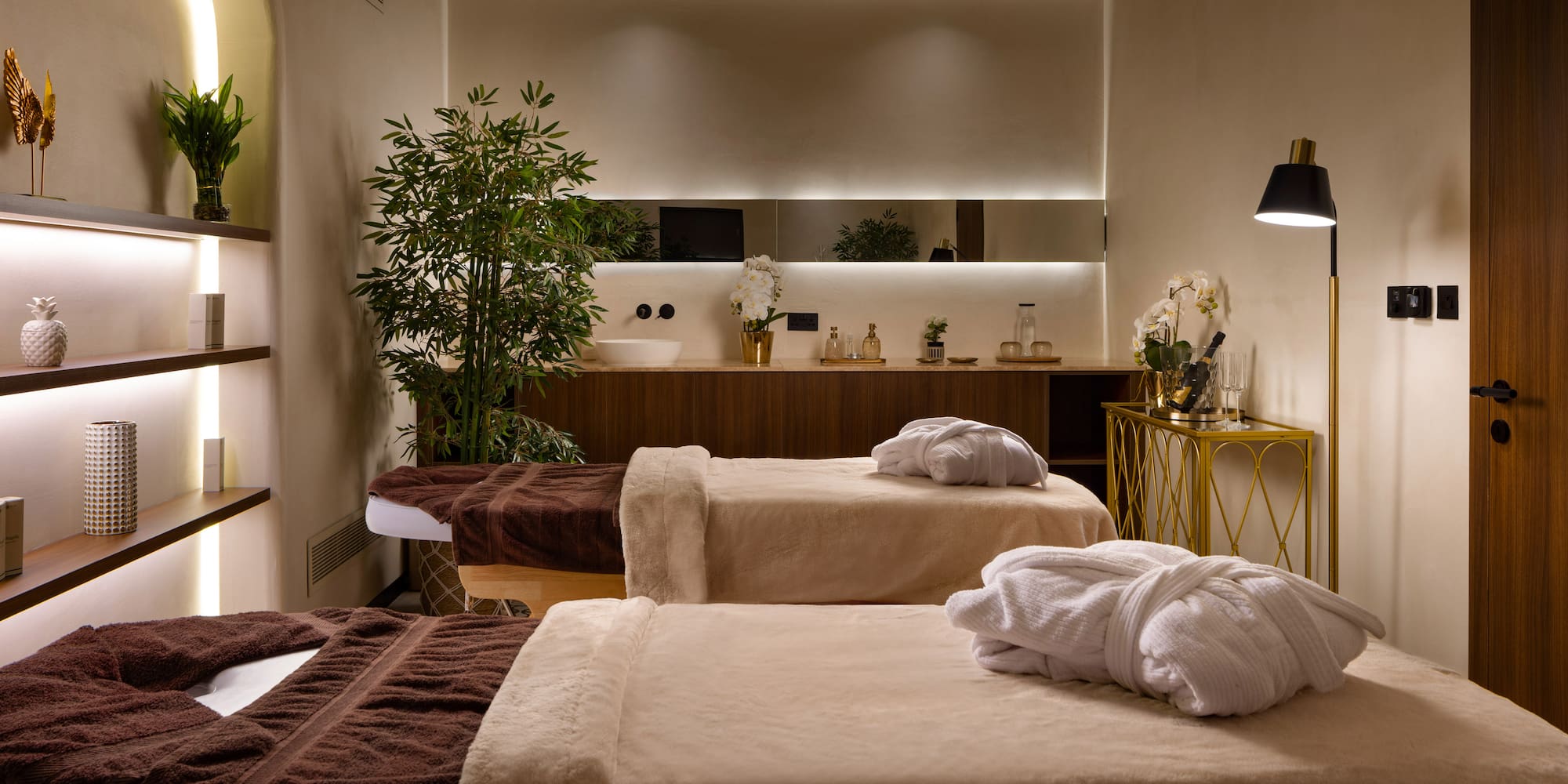 a room with beds and towels