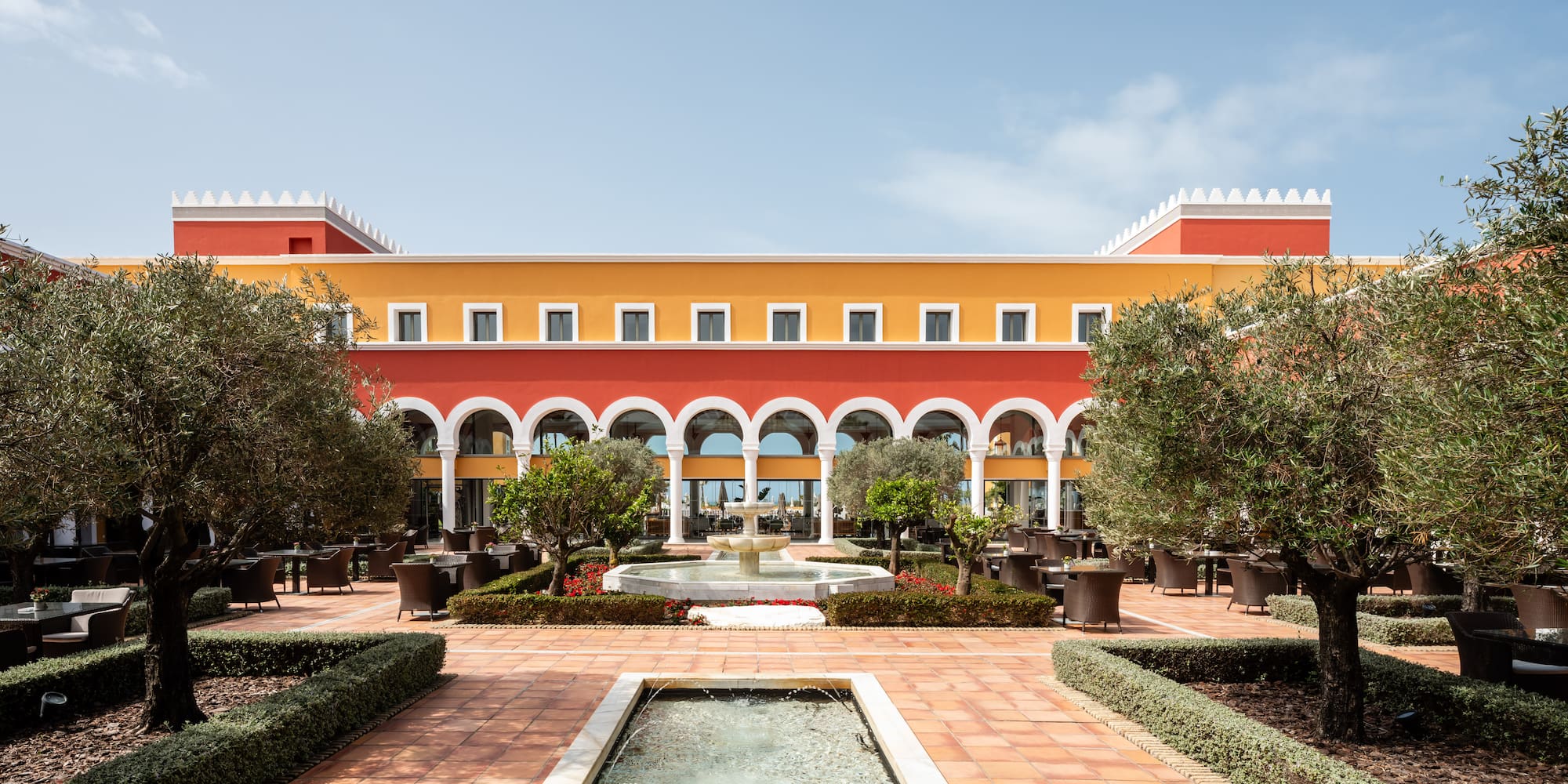 a building with a fountain in front of it