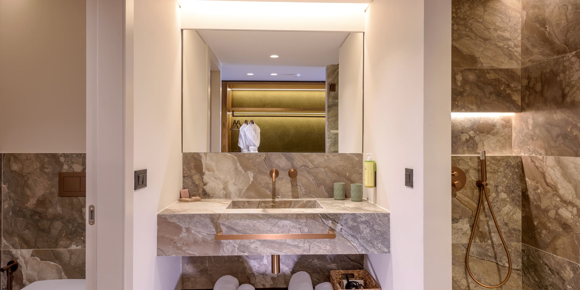 a bathroom with a sink and a shower.