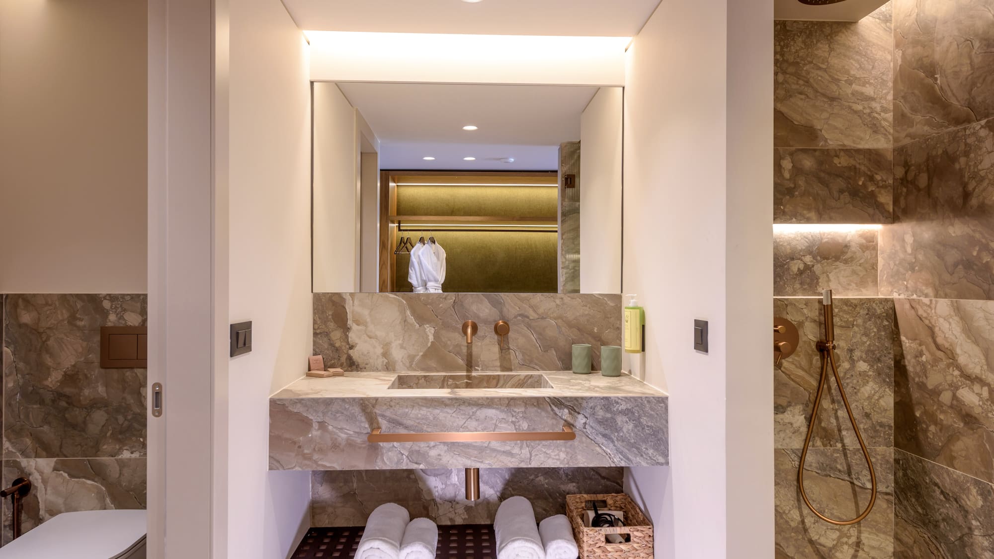 a bathroom with a sink and a shower.