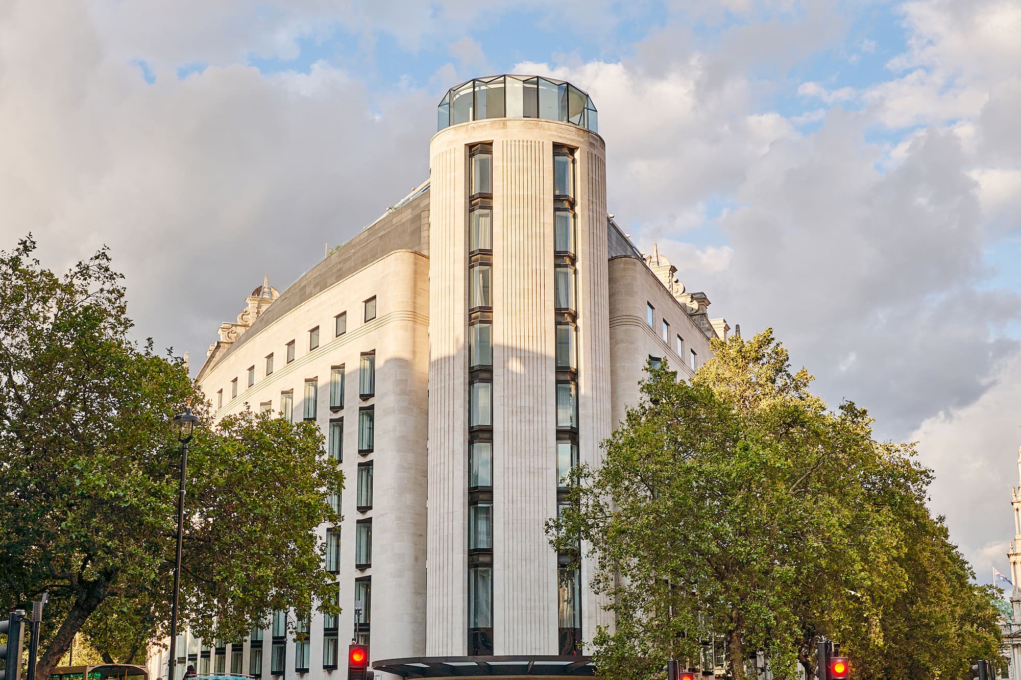 a group of people walking around a building