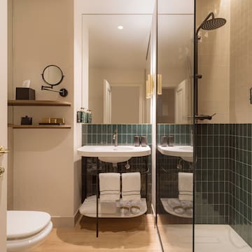 a bathroom with a shower and sink