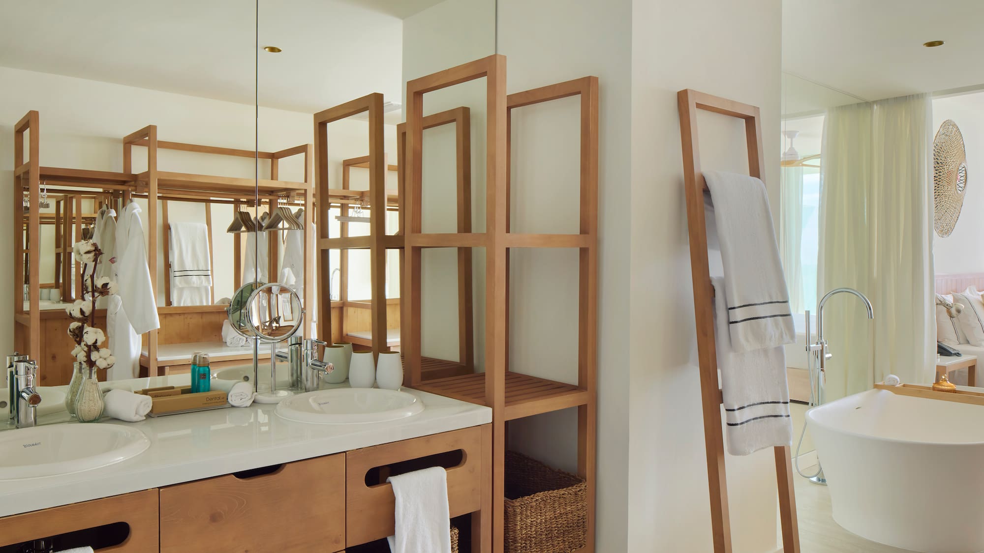 a bathroom with a mirror and a sink