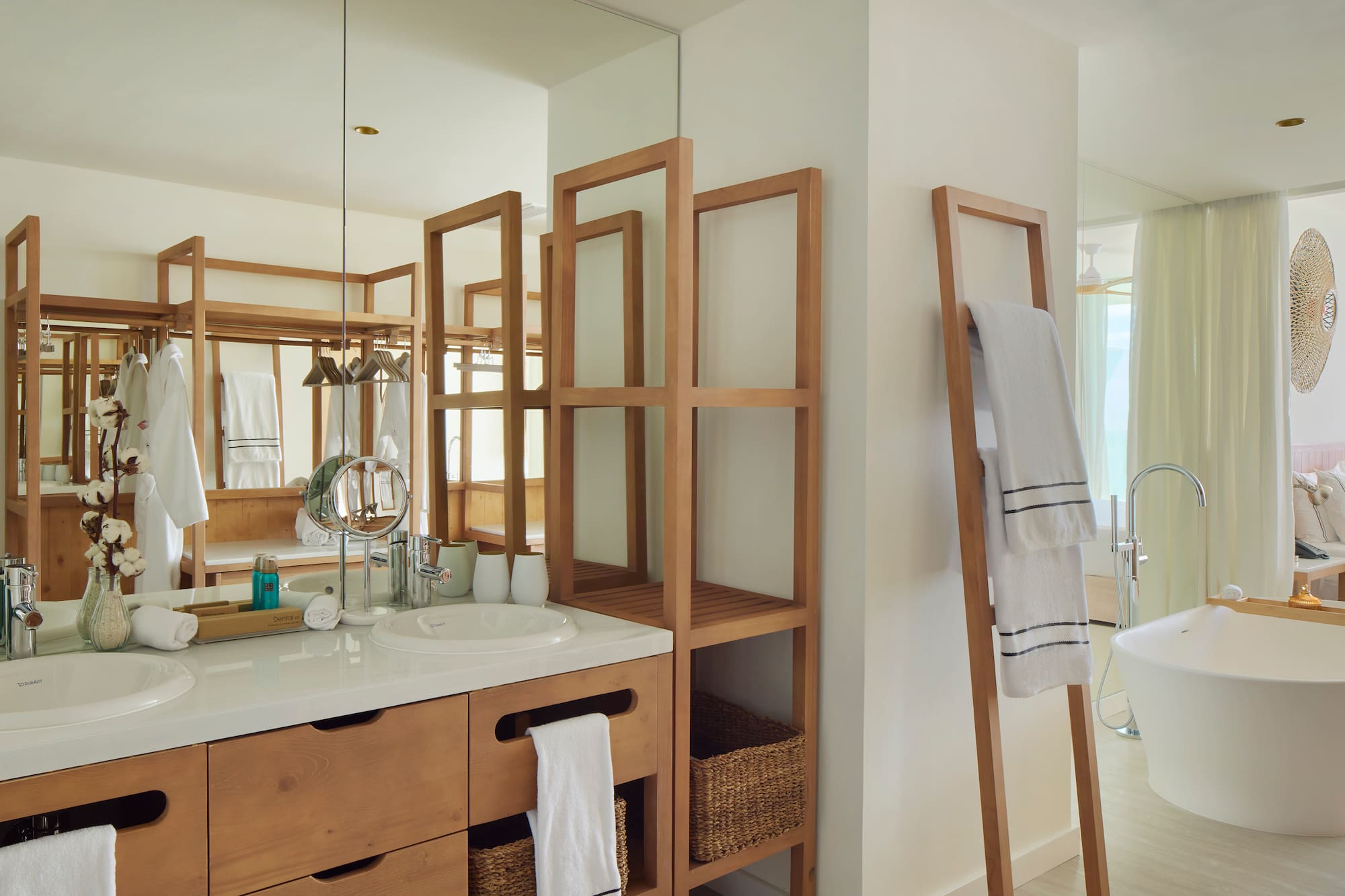 a bathroom with a mirror and a sink