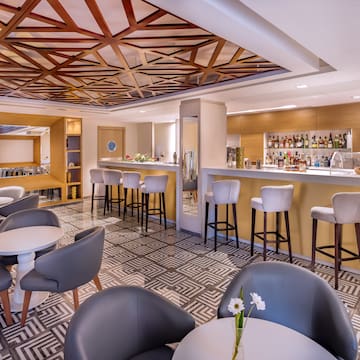 a room with tables and chairs