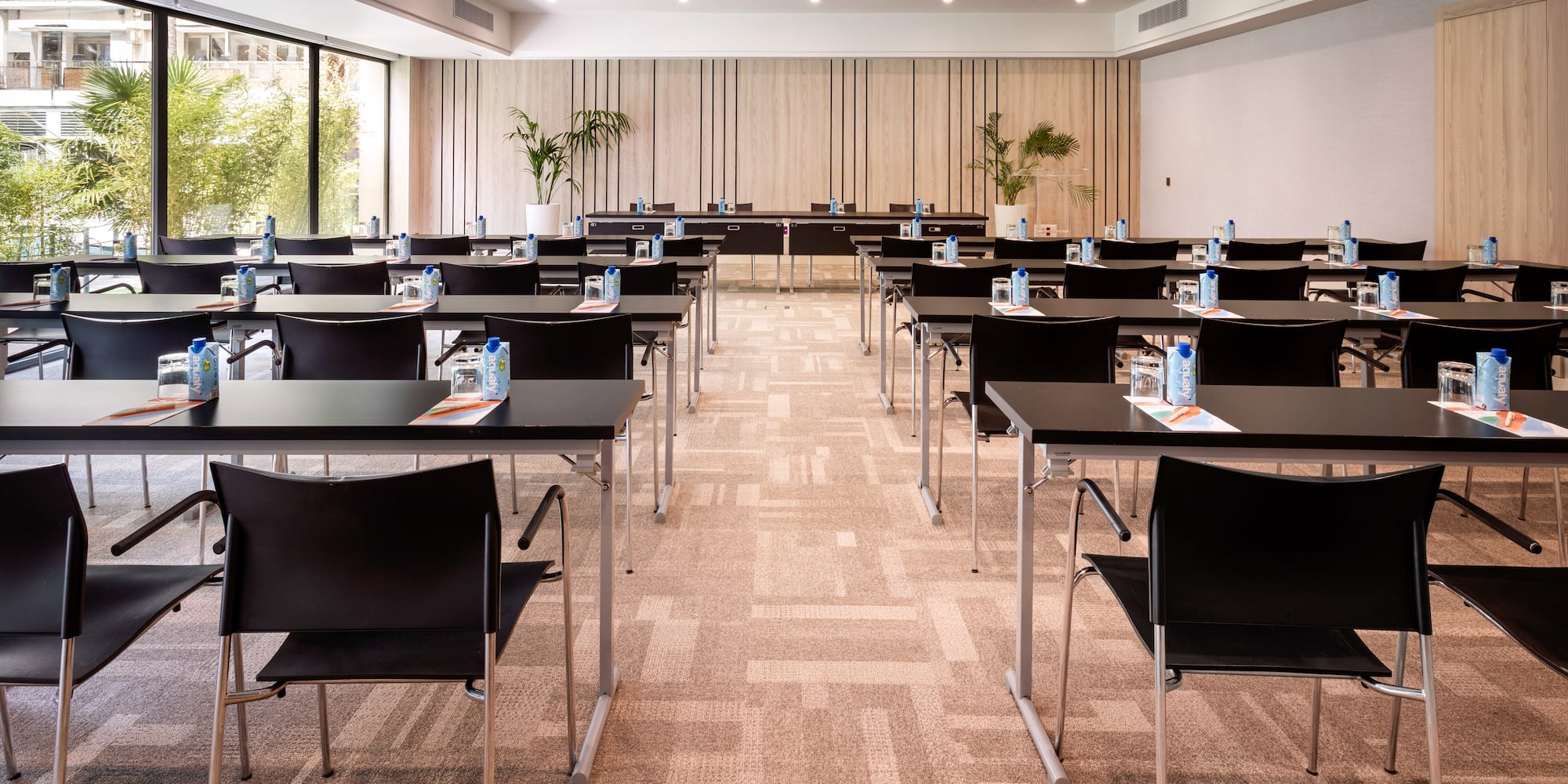 a room with tables and chairs