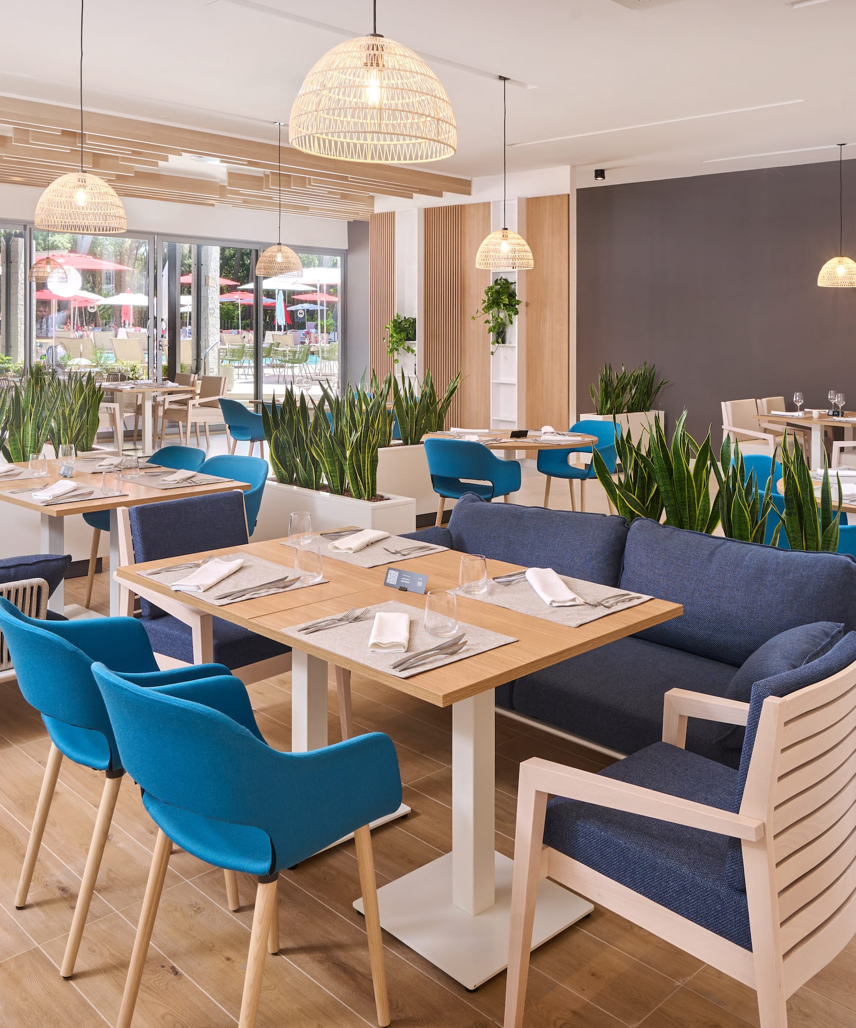 a restaurant with tables and chairs