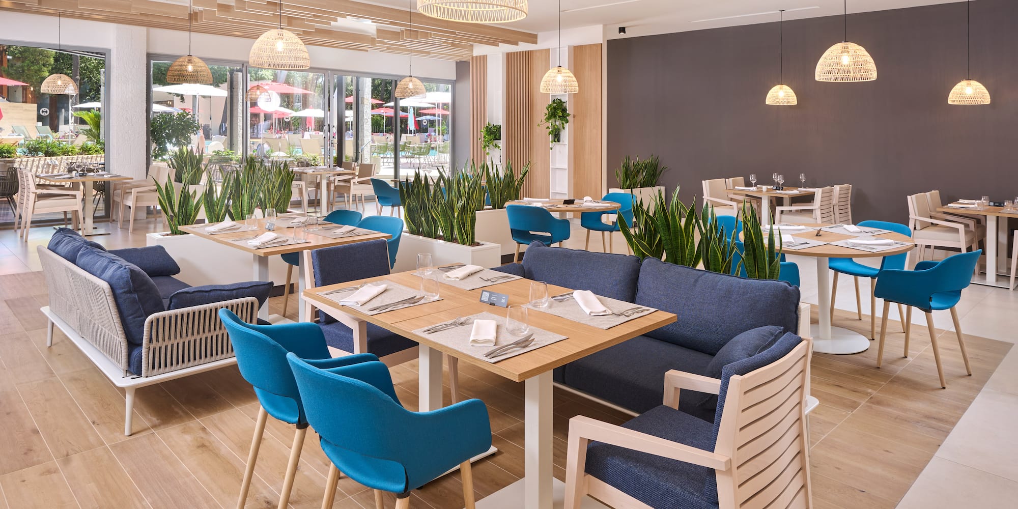 a restaurant with tables and chairs