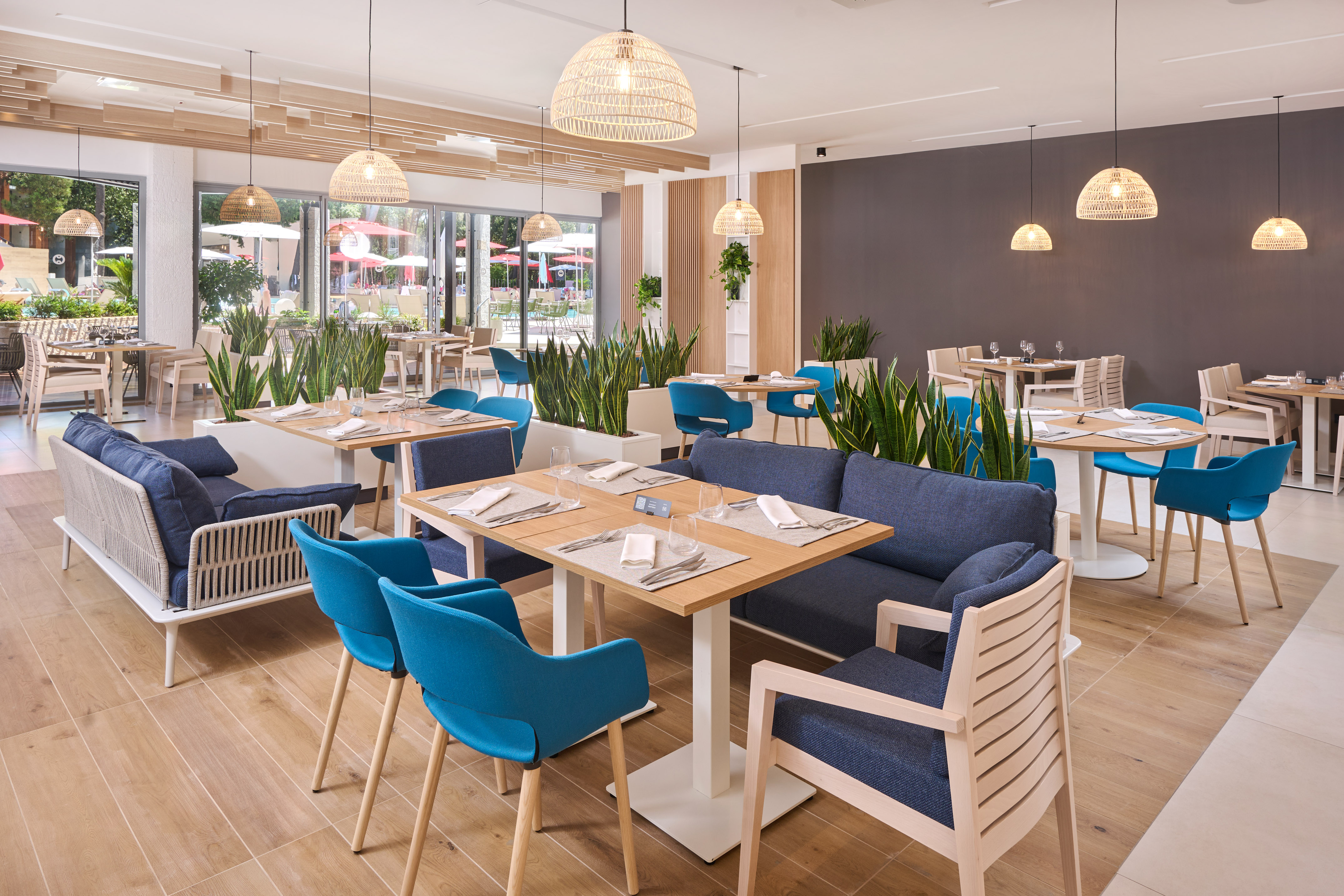 a restaurant with tables and chairs