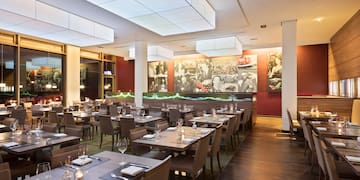 a restaurant with tables and chairs