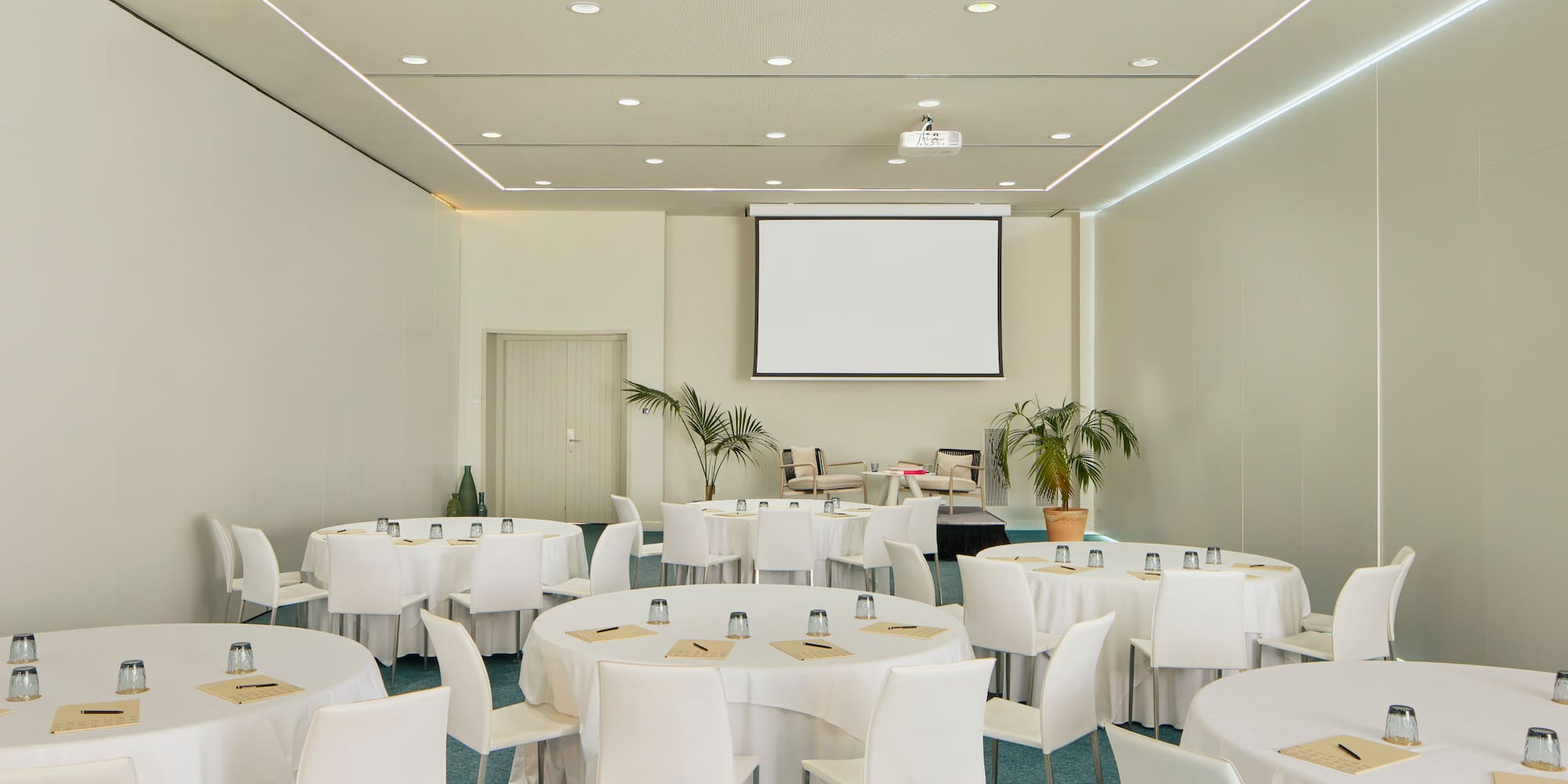 a room with tables and chairs