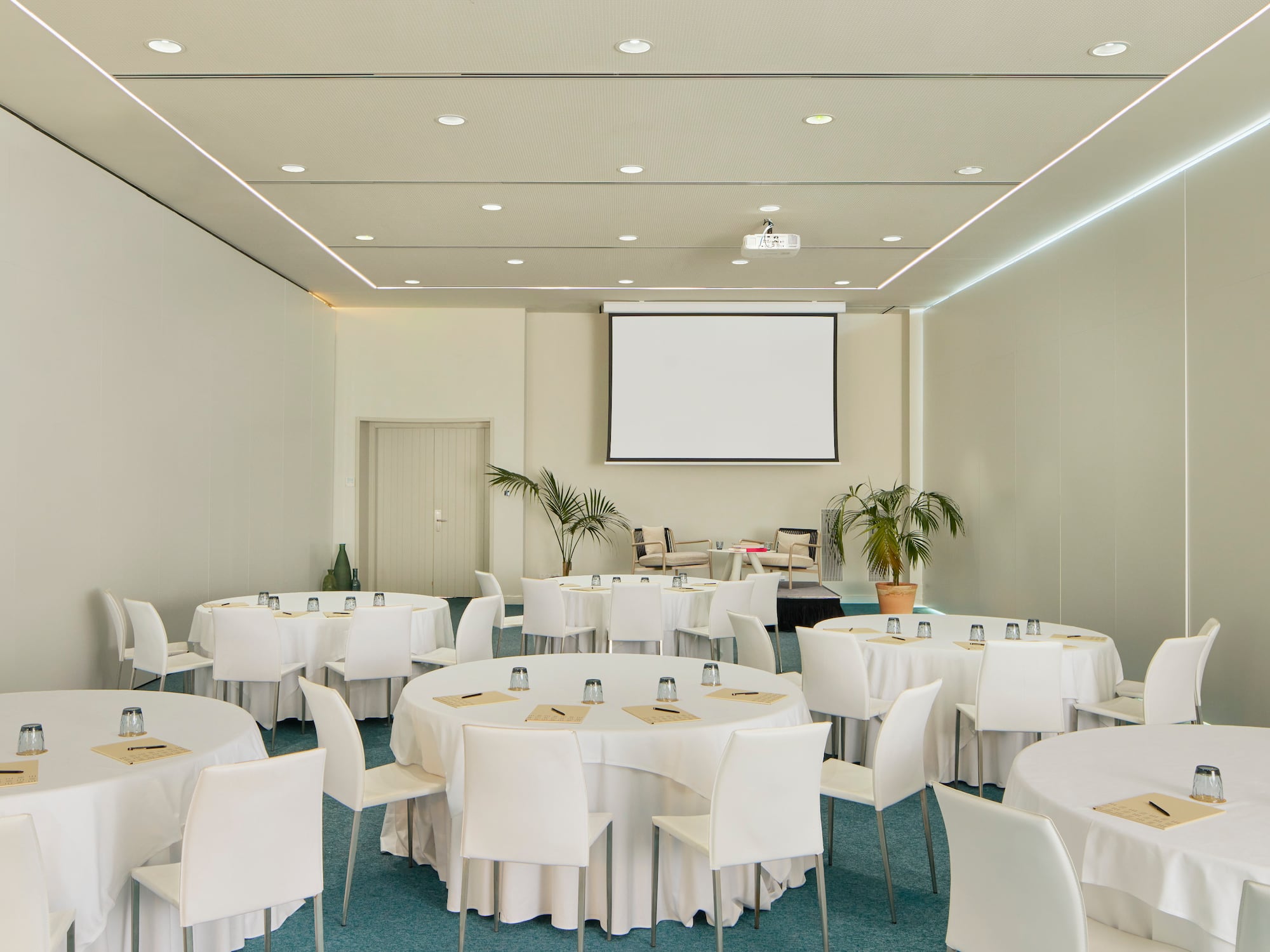 a room with tables and chairs