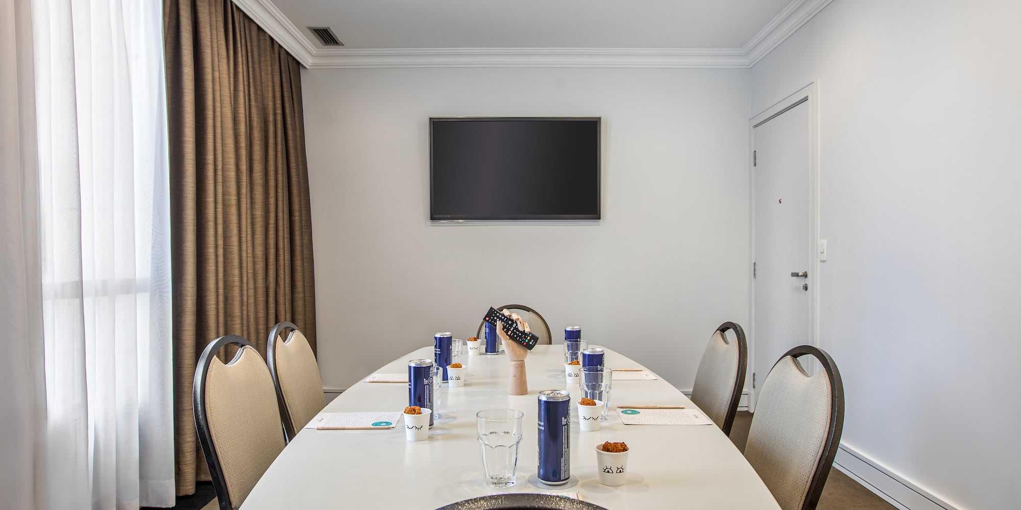 a room with a table and chairs