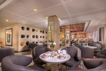 a room with a table and chairs