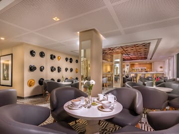 a room with a table and chairs