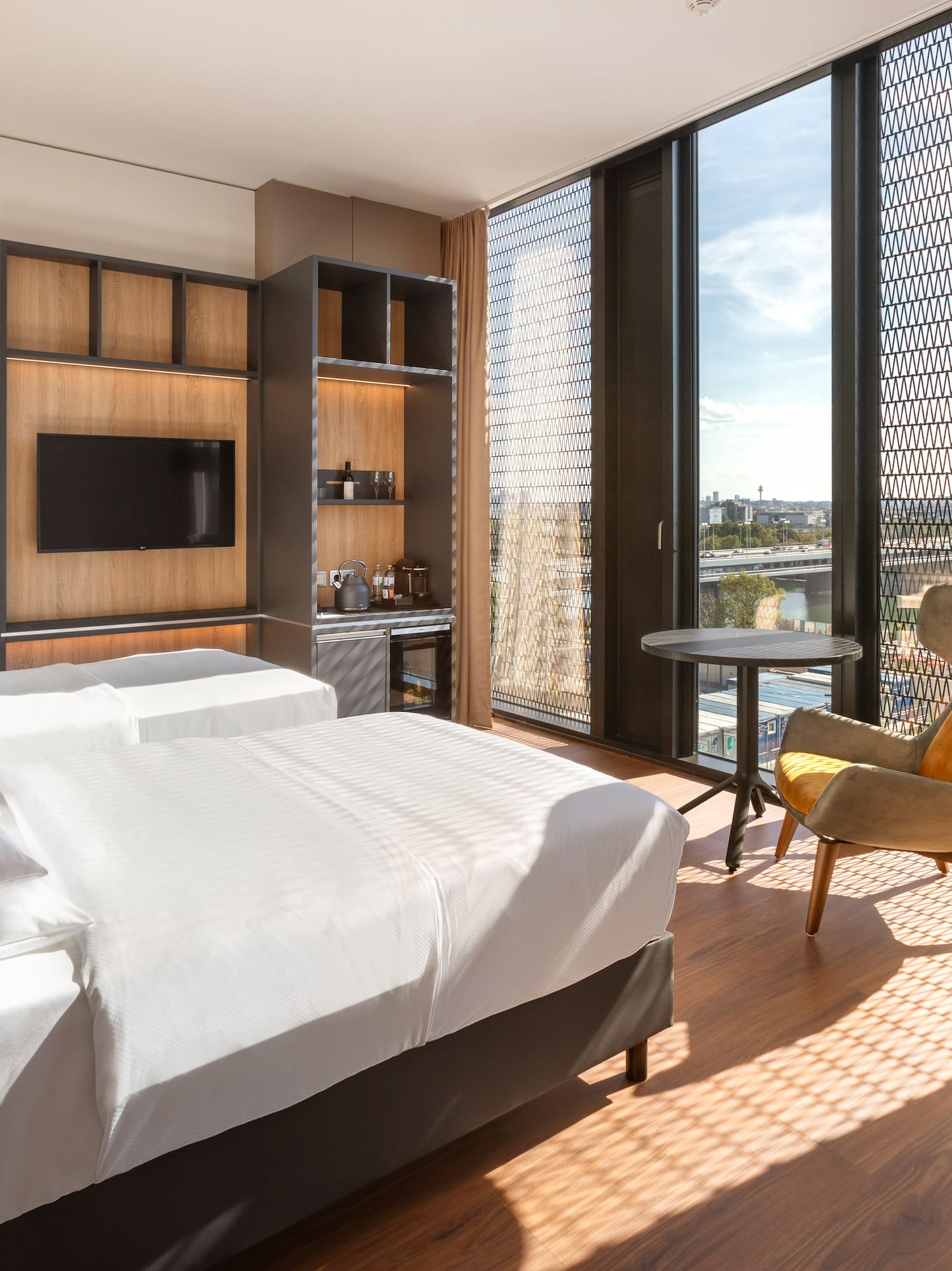 a room with a bed and a chair