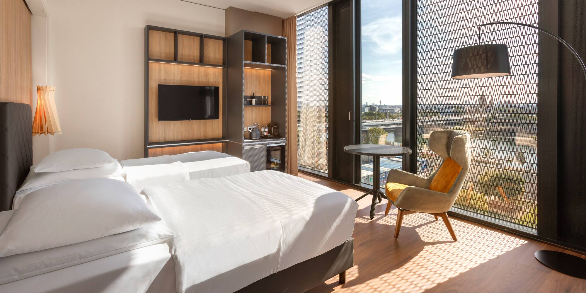 a room with a bed and a chair