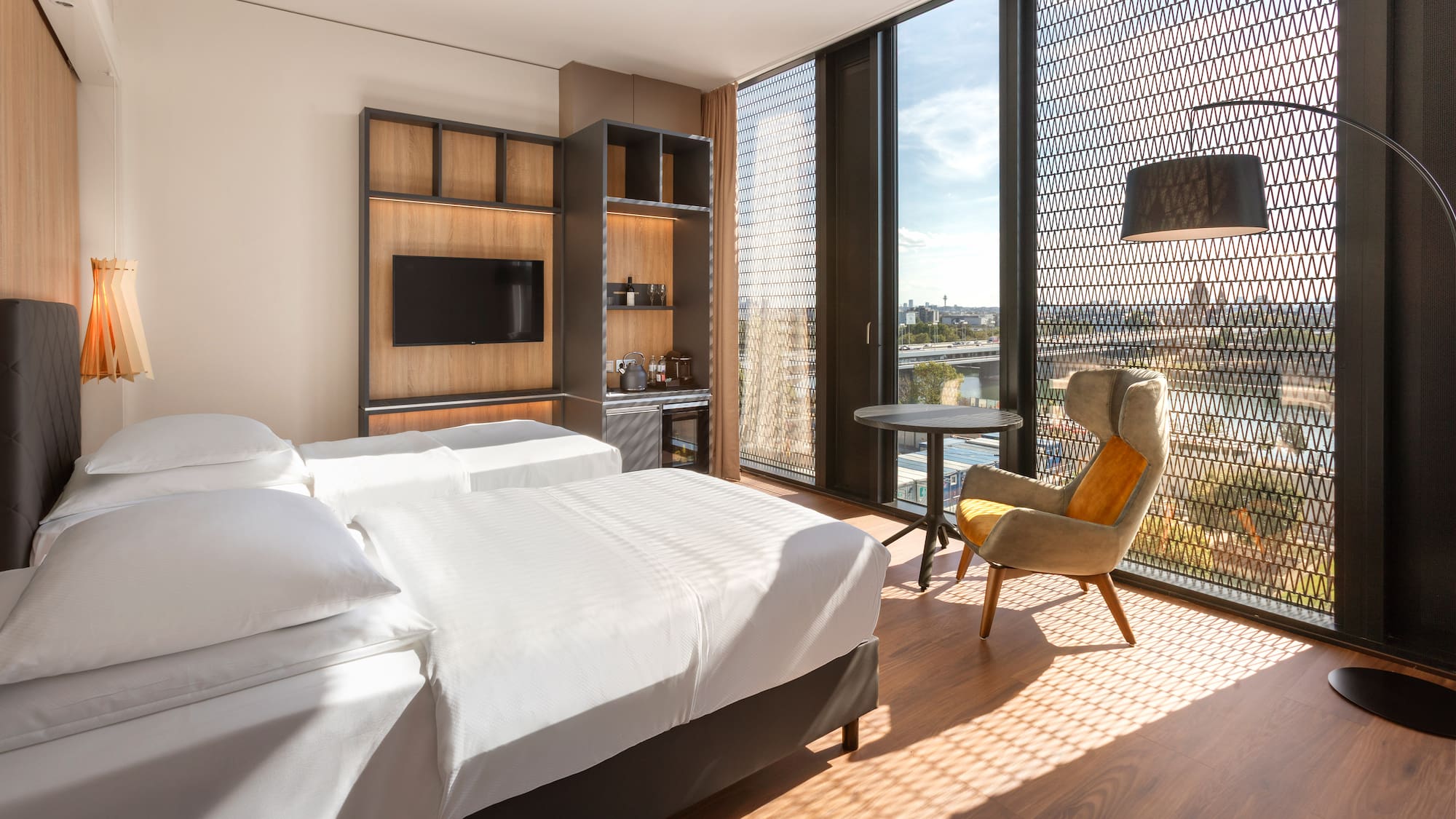 a room with a bed and a chair