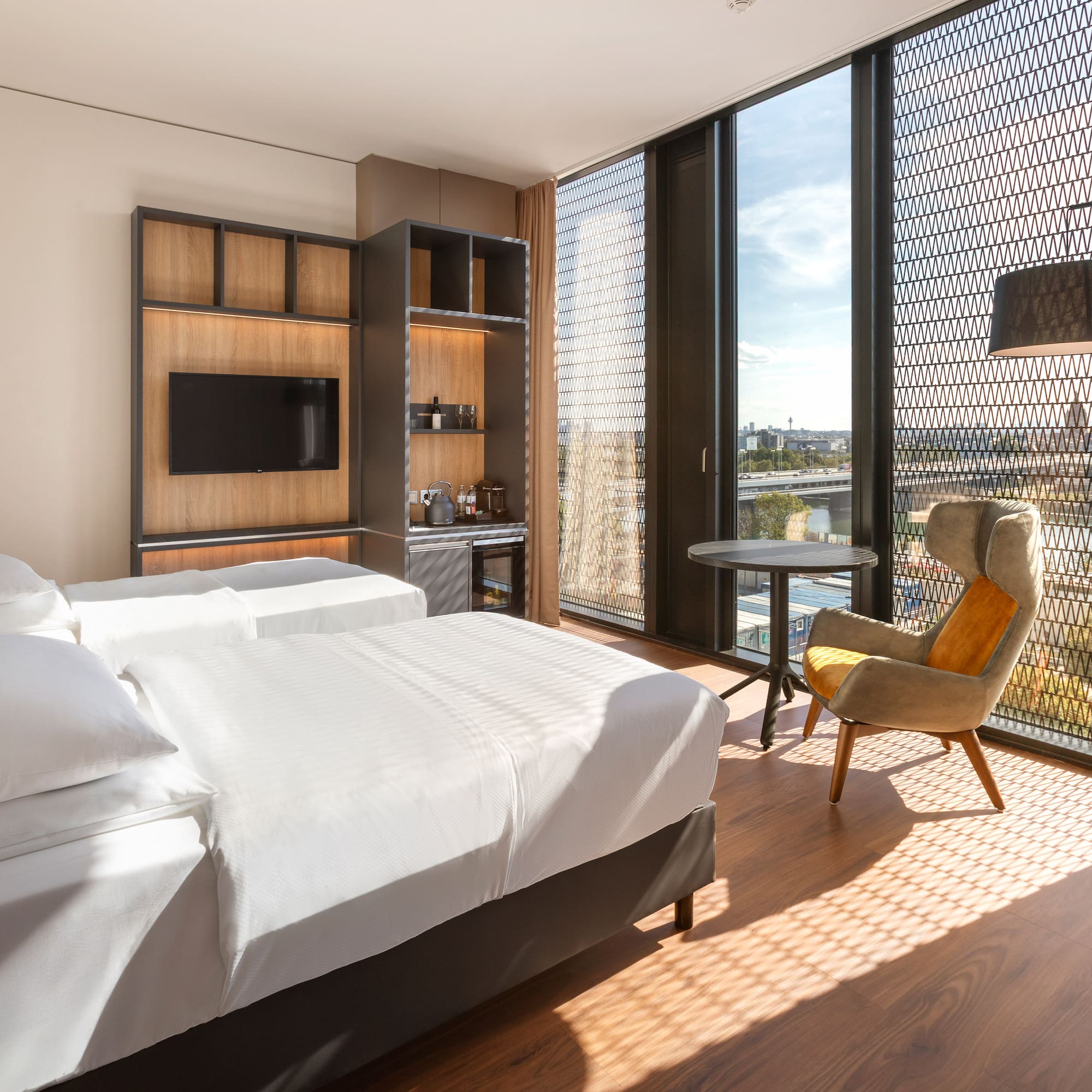 a room with a bed and a chair