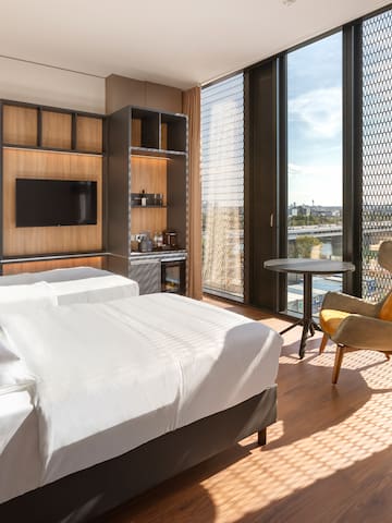 a room with a bed and a chair