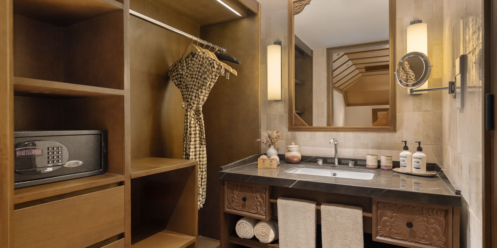 a bathroom with a mirror and a sink