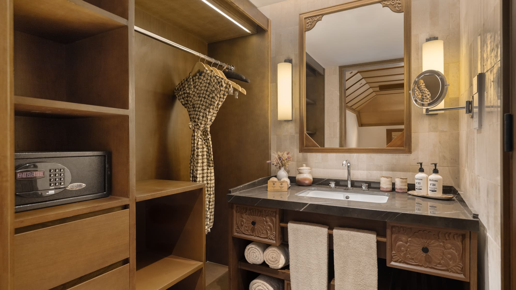 a bathroom with a mirror and a sink