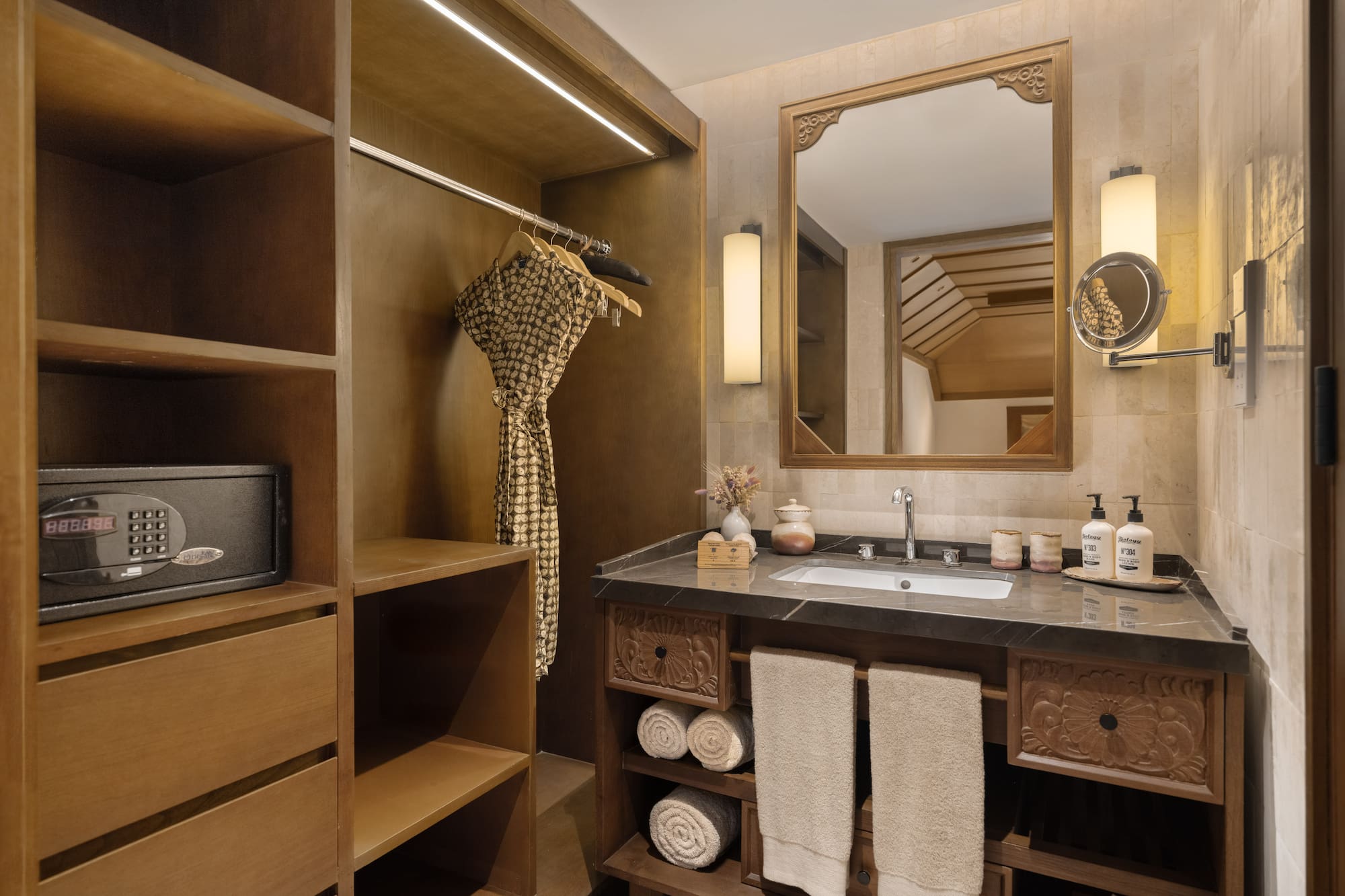 a bathroom with a mirror and a sink