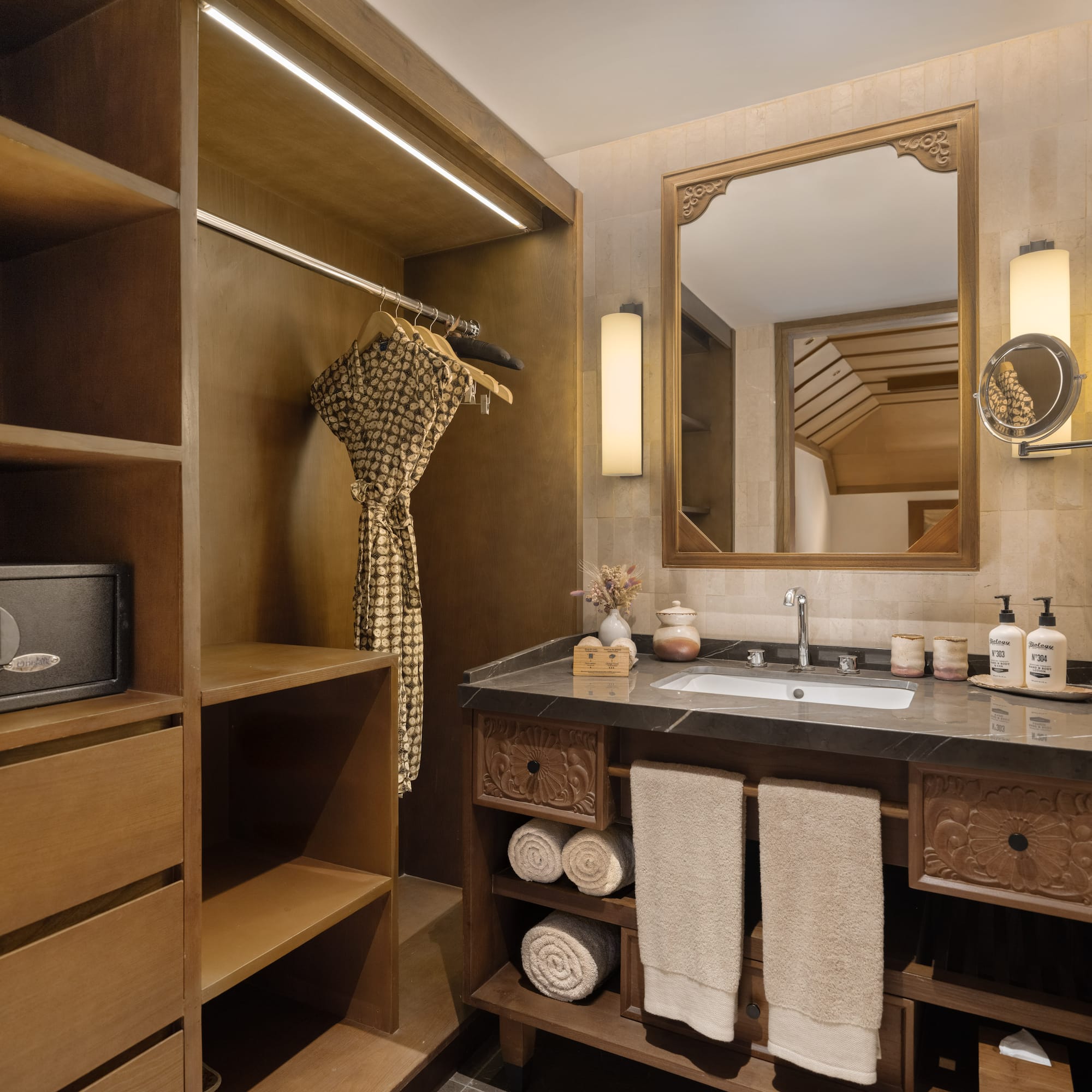 a bathroom with a mirror and a sink