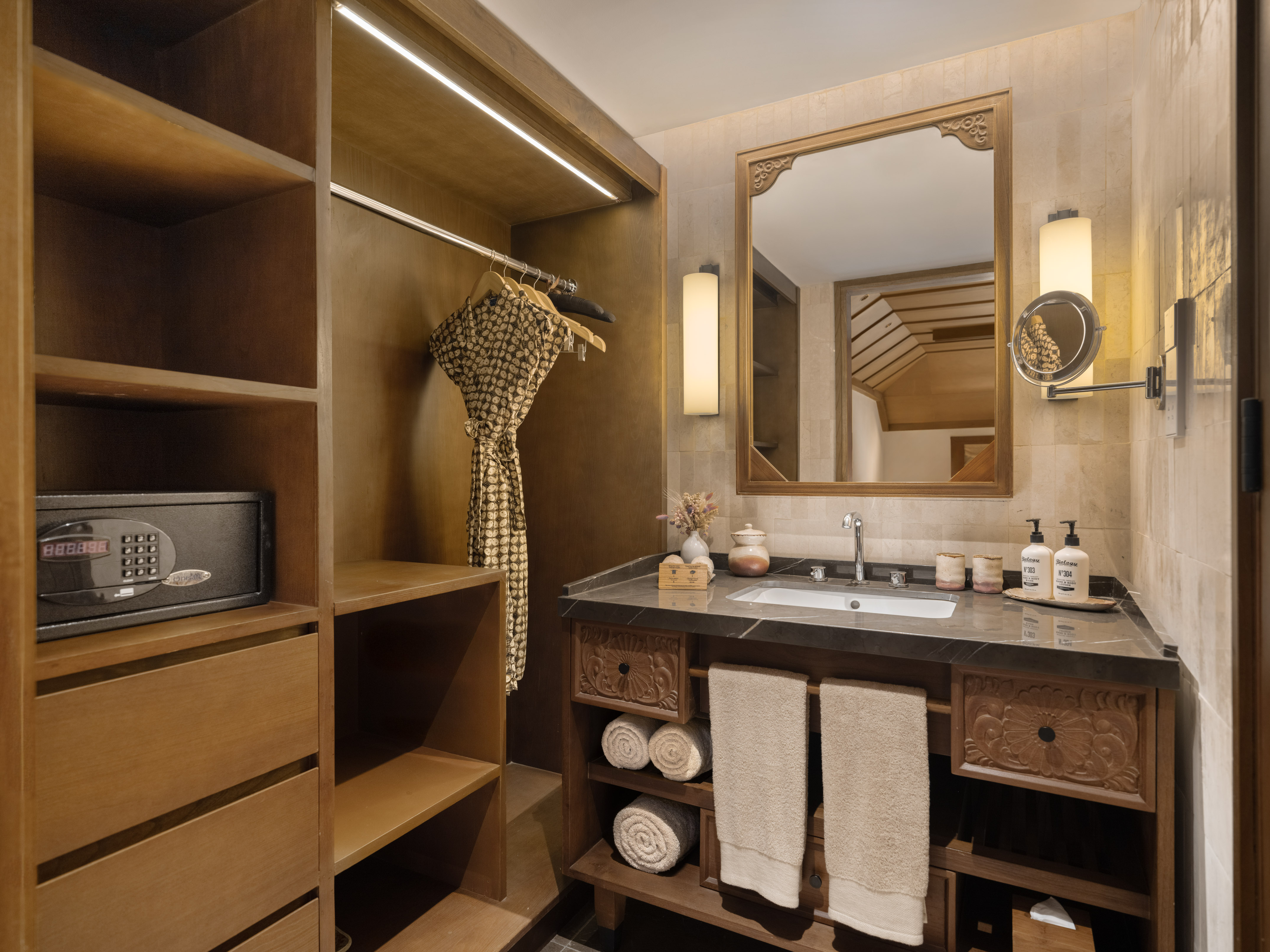 a bathroom with a mirror and a sink
