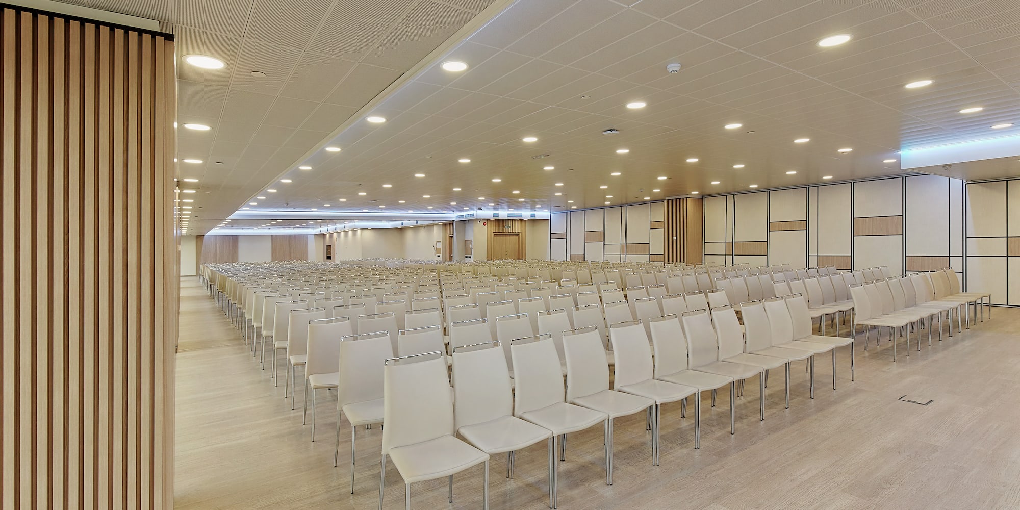 a room with rows of chairs