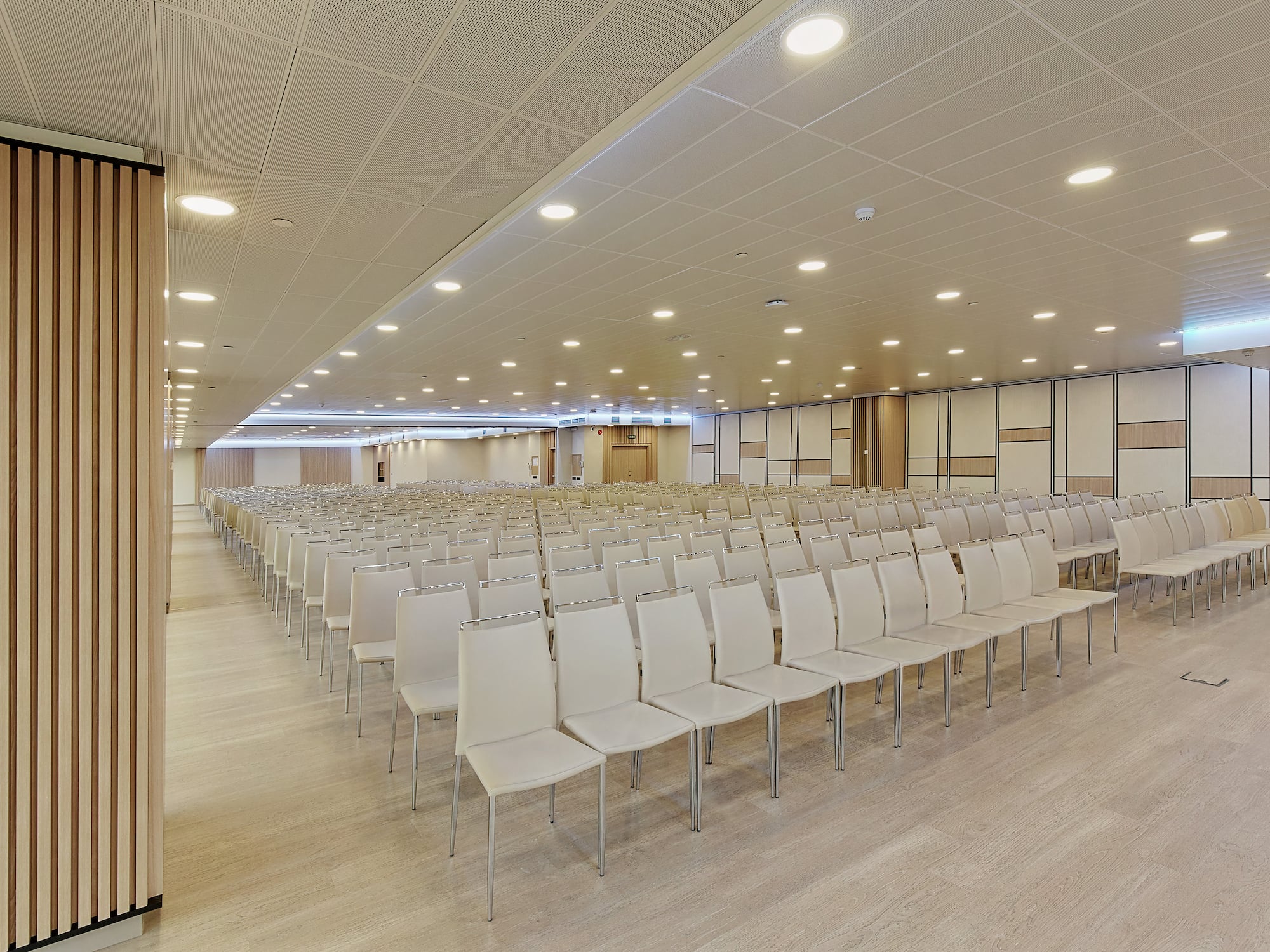 a room with rows of chairs