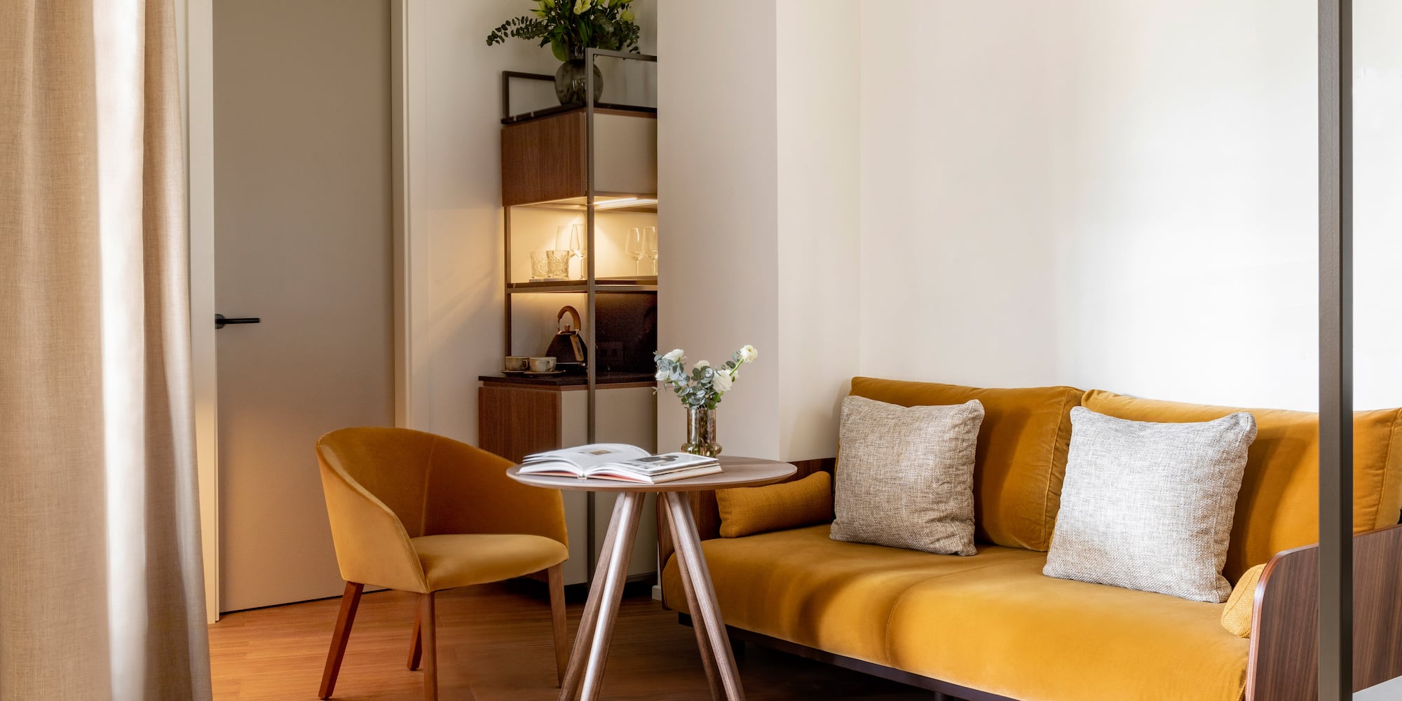 a living room with a couch and a table