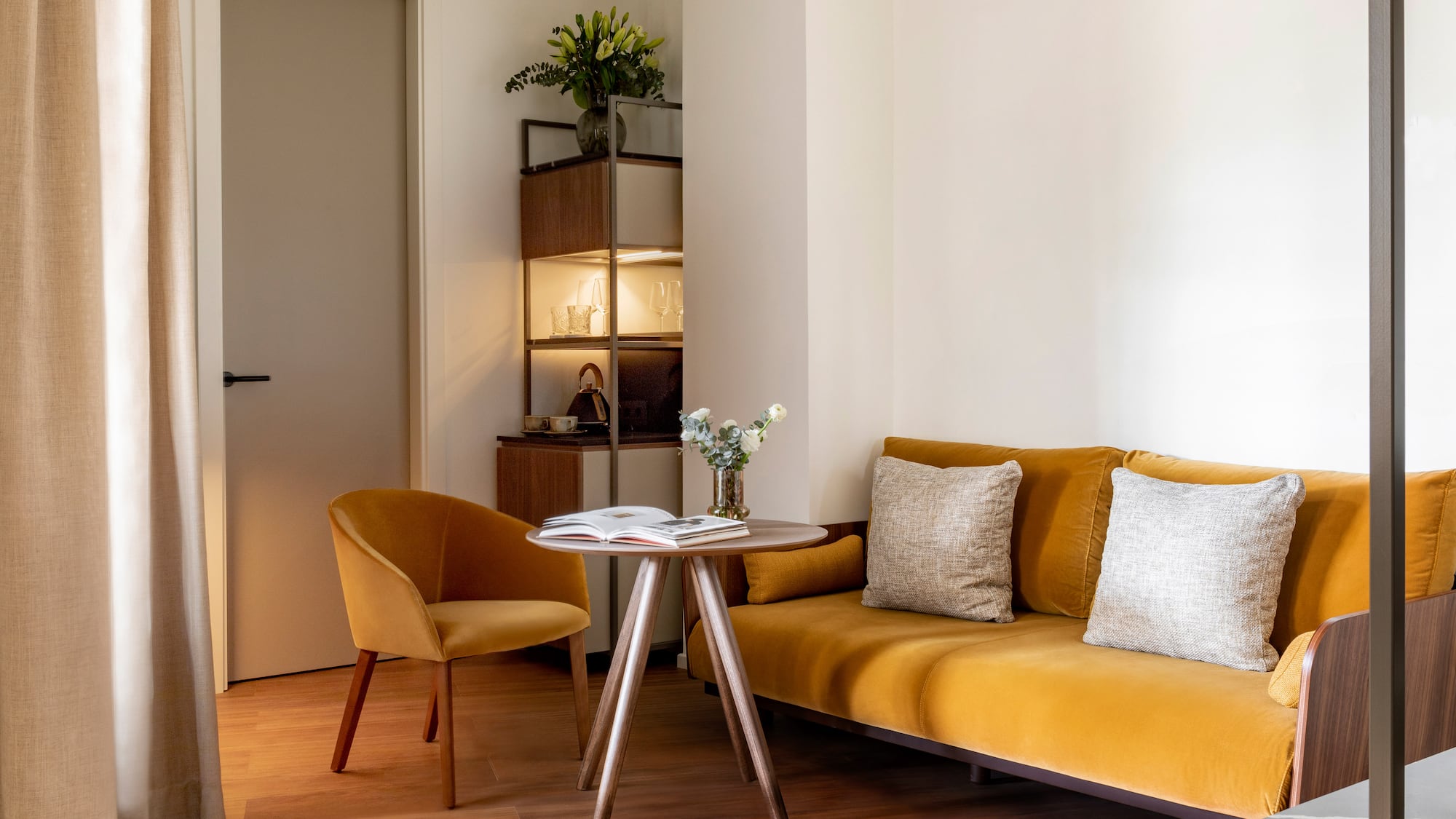 a living room with a couch and a table