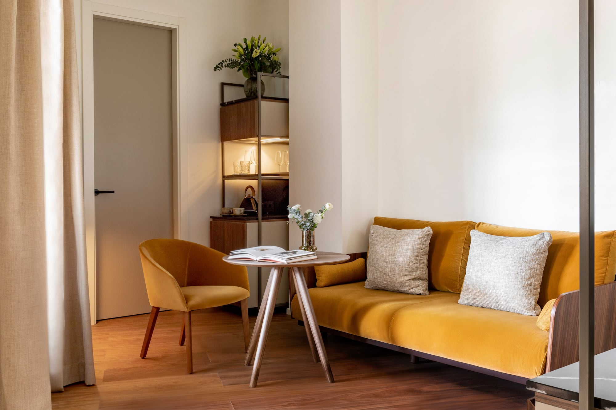 a living room with a couch and a table