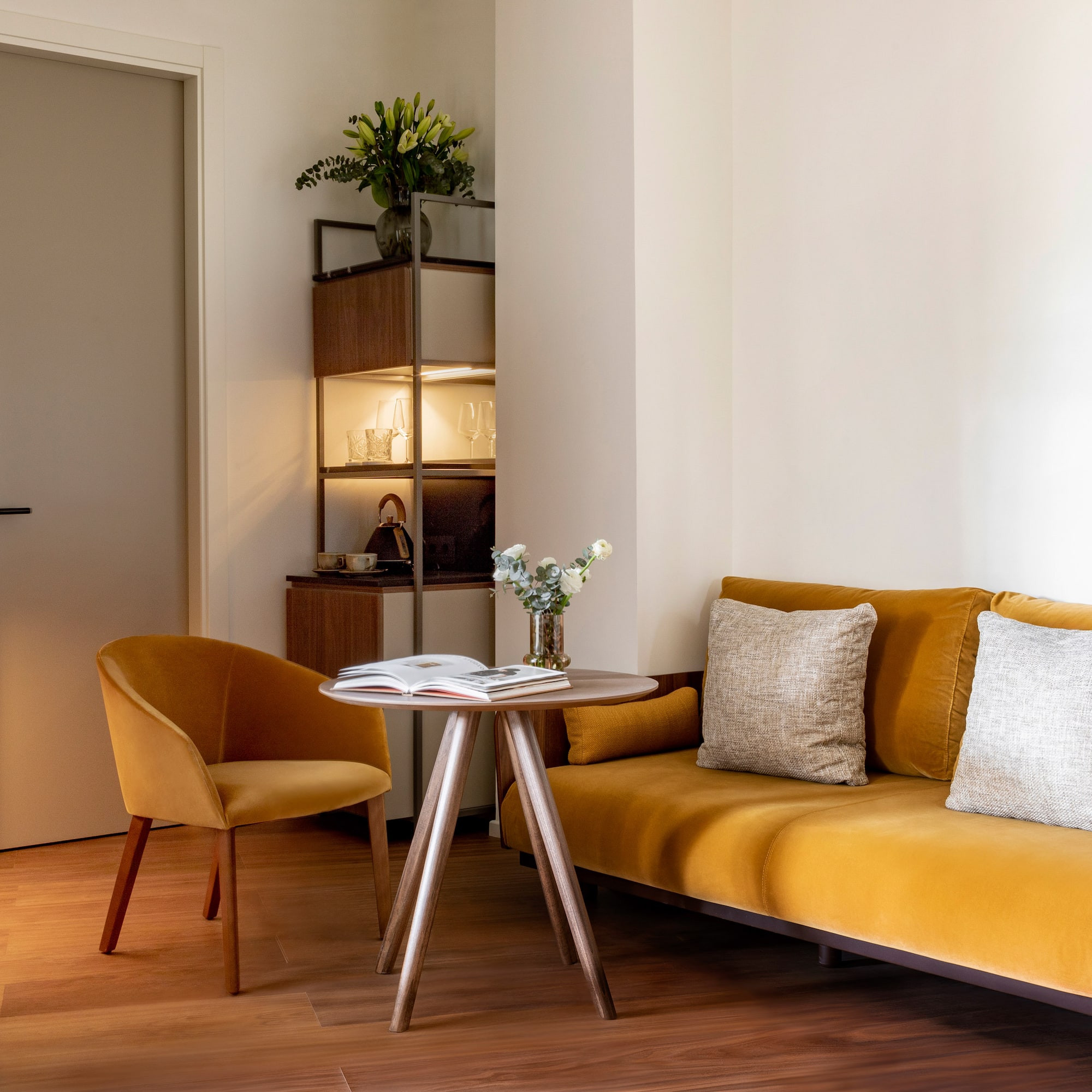 a living room with a couch and a table