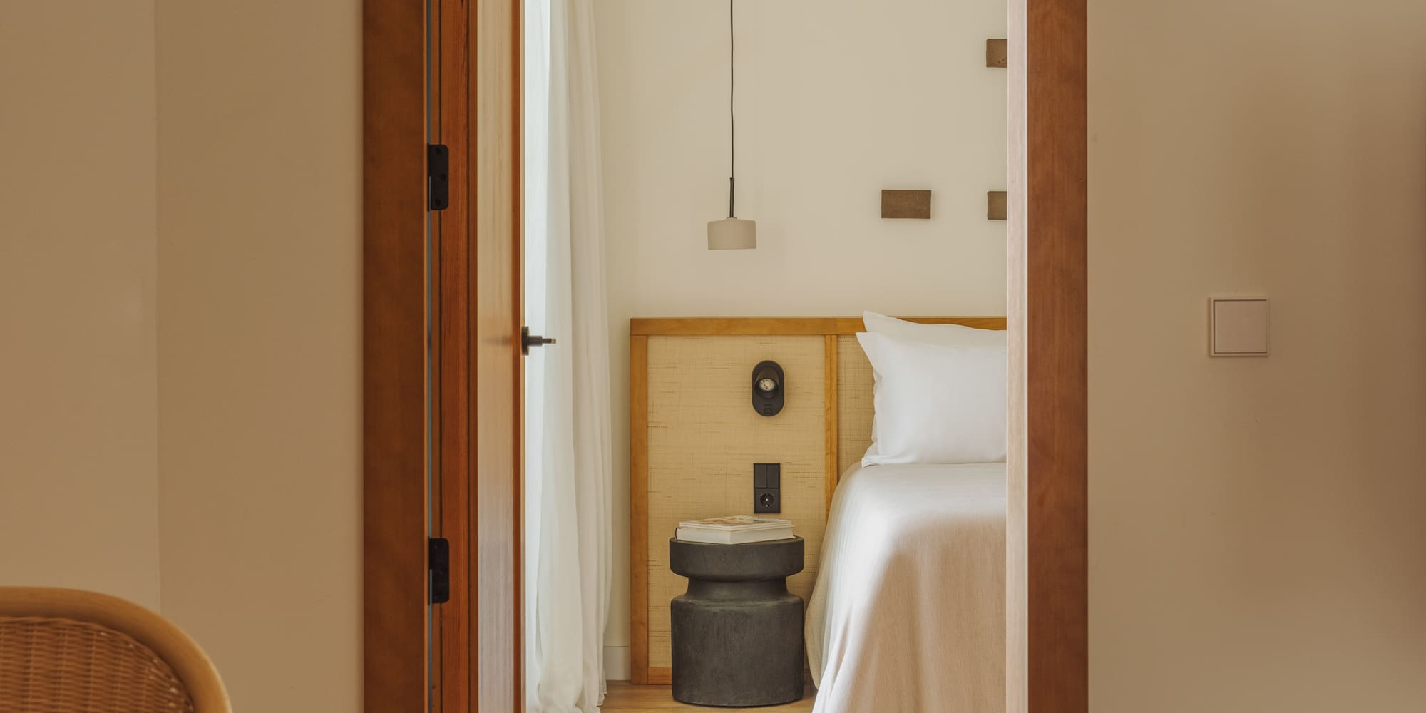 a room with a bed and a chair