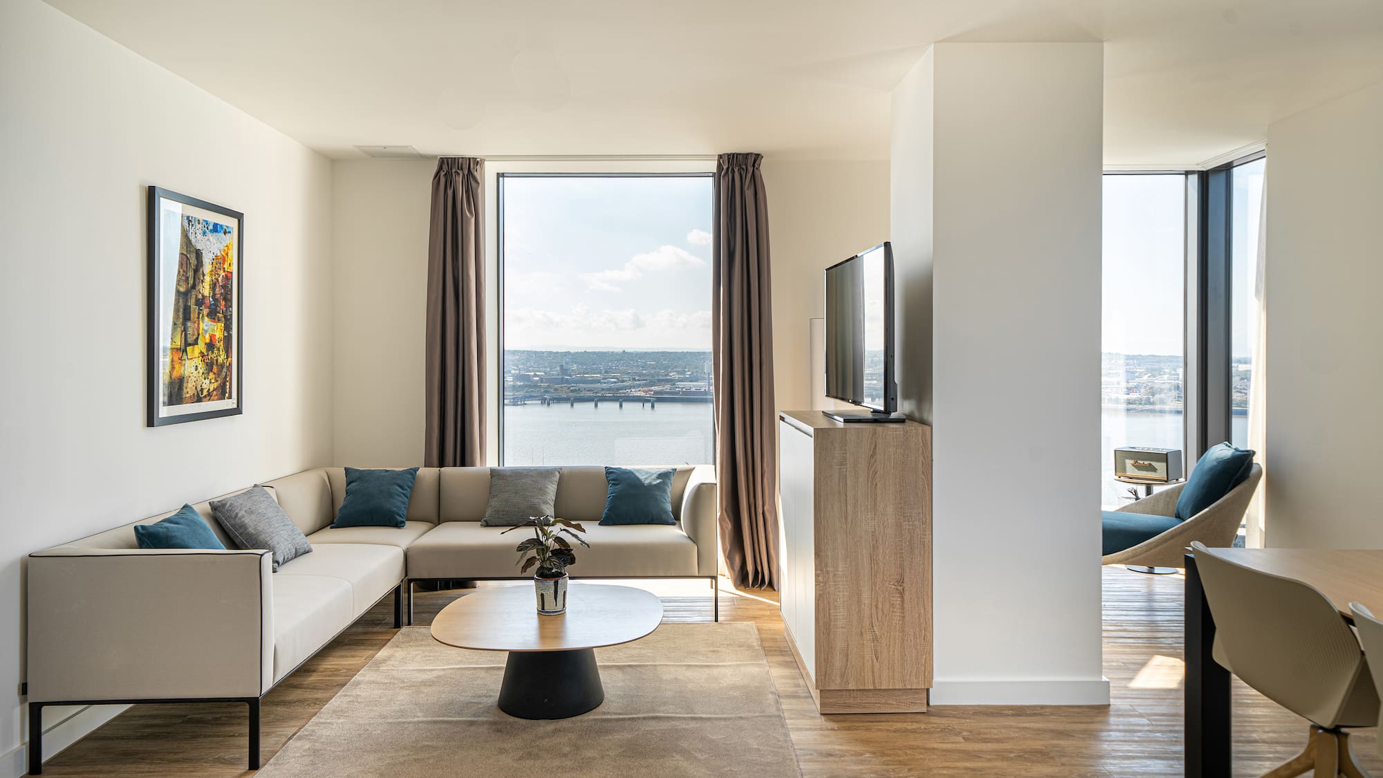 a living room with a couch and a television