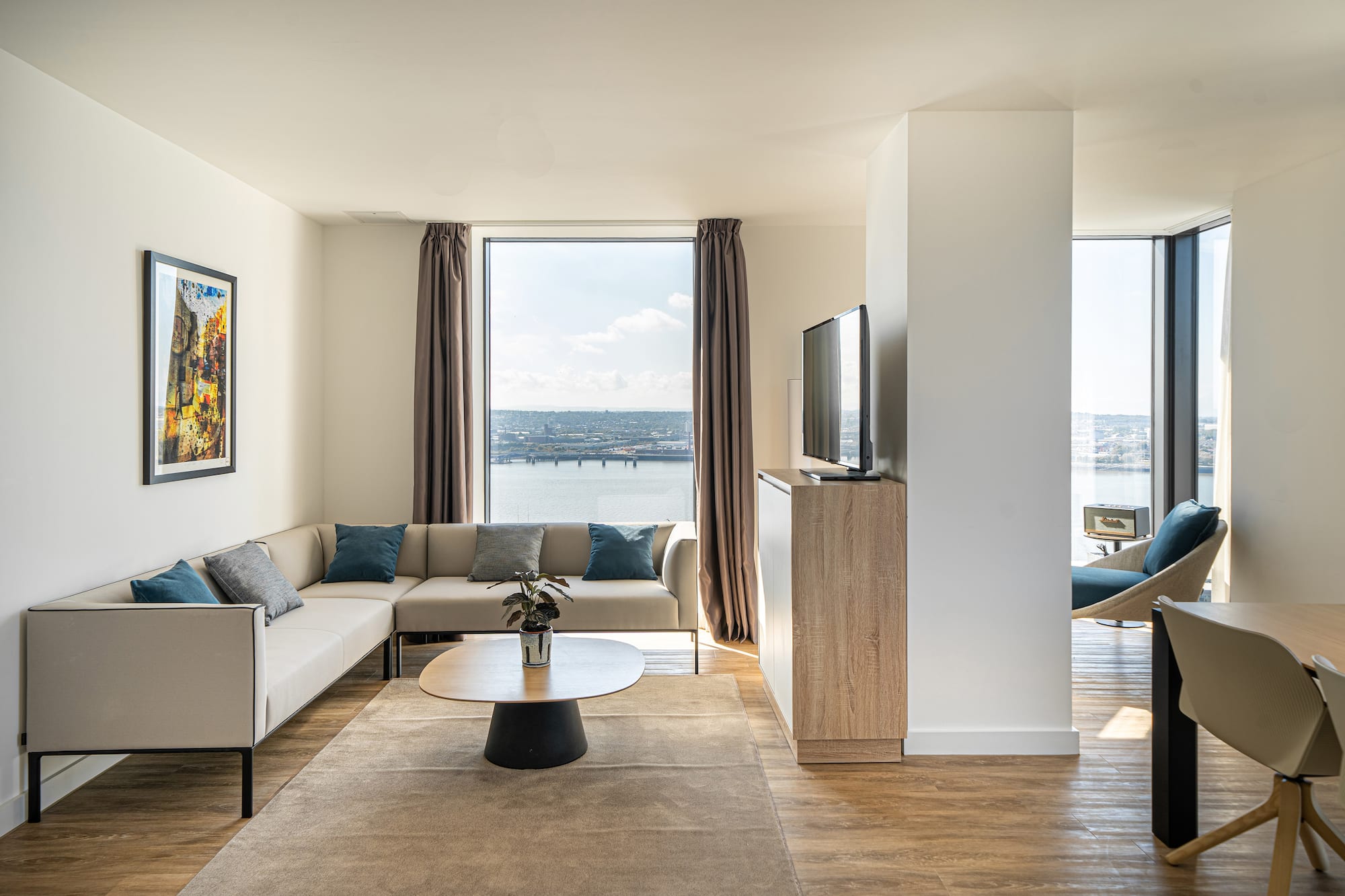 a living room with a couch and a television
