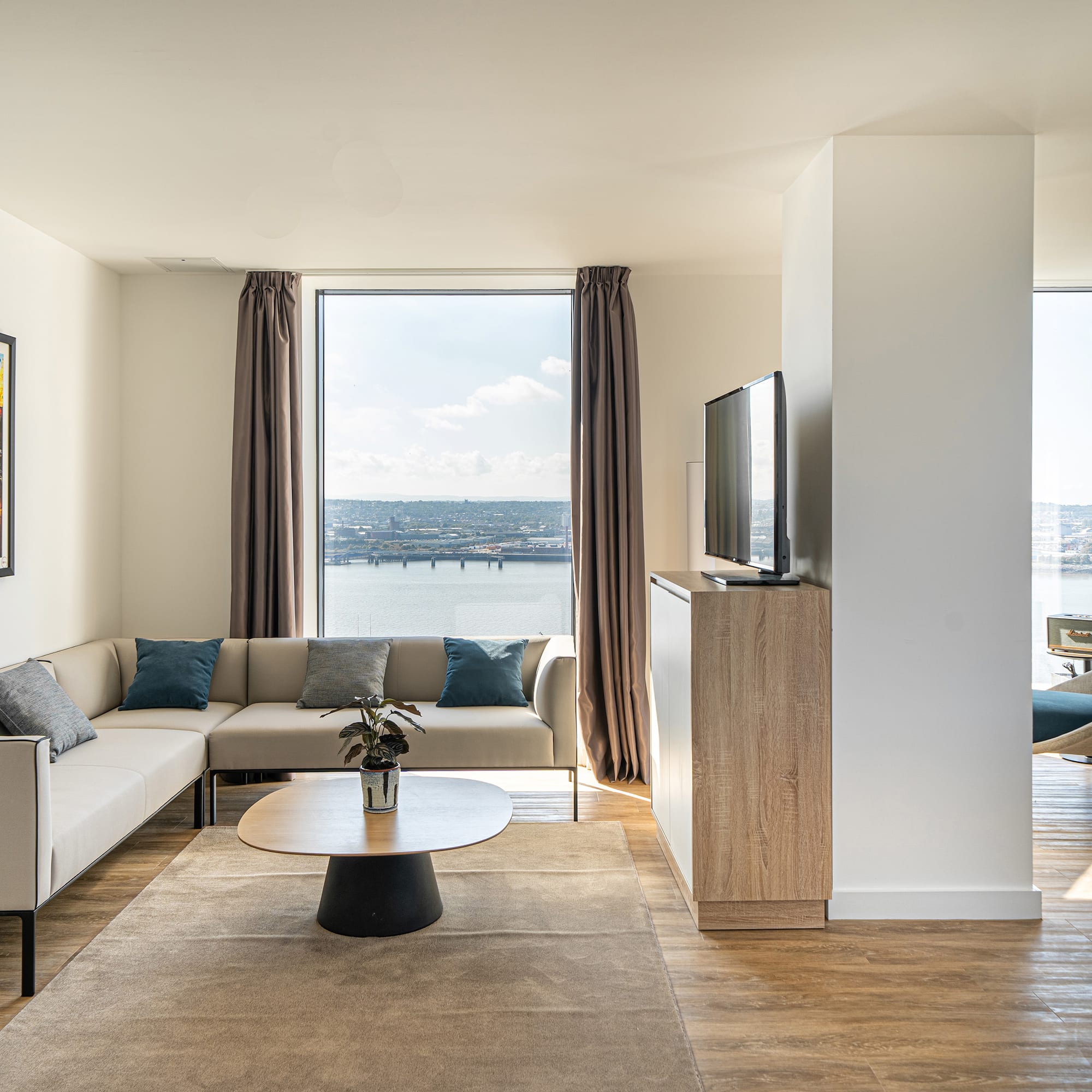 a living room with a couch and a television