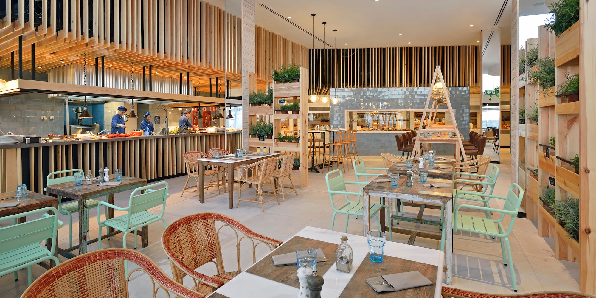 a restaurant with tables and chairs