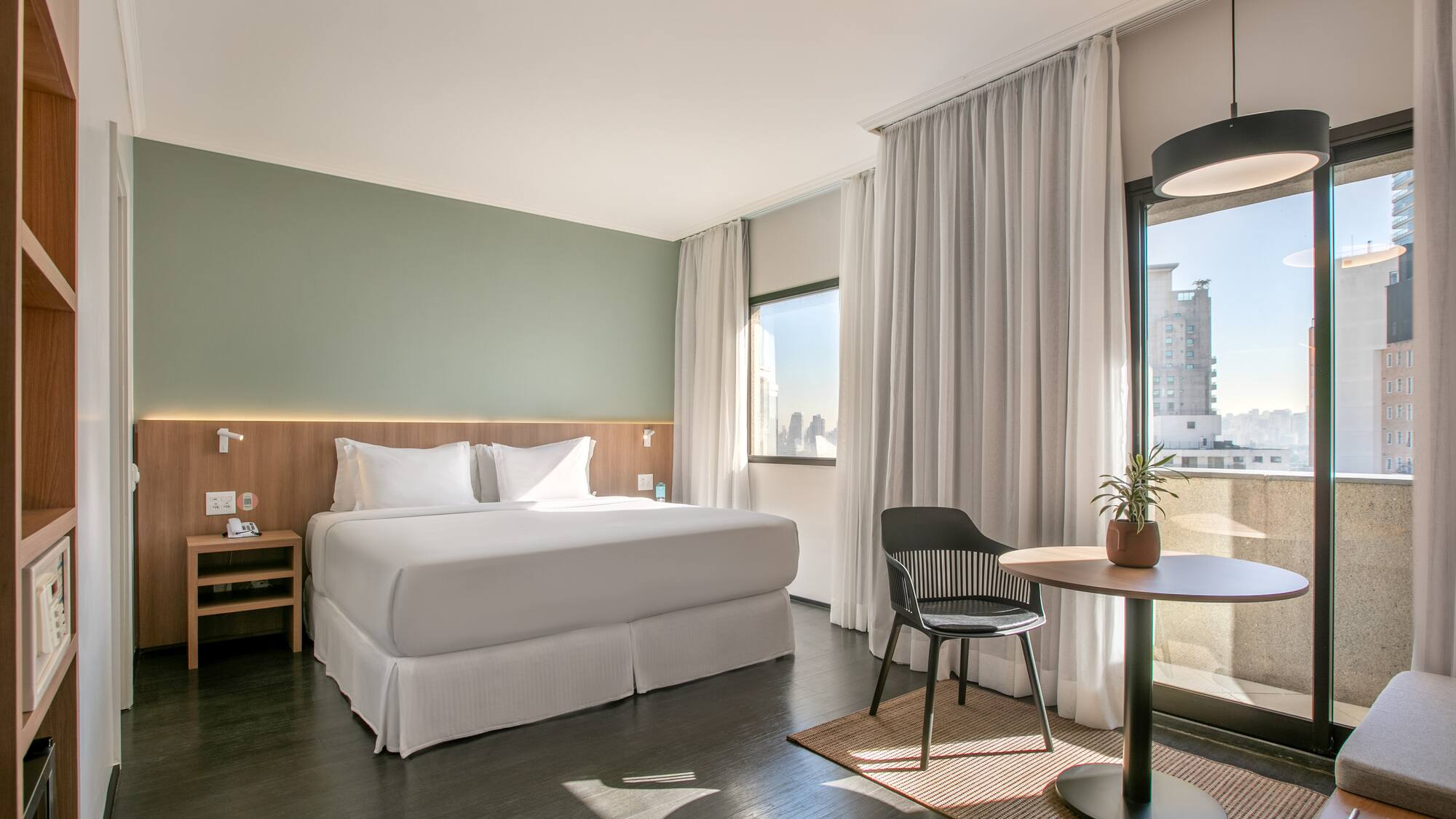 a room with a bed and a table