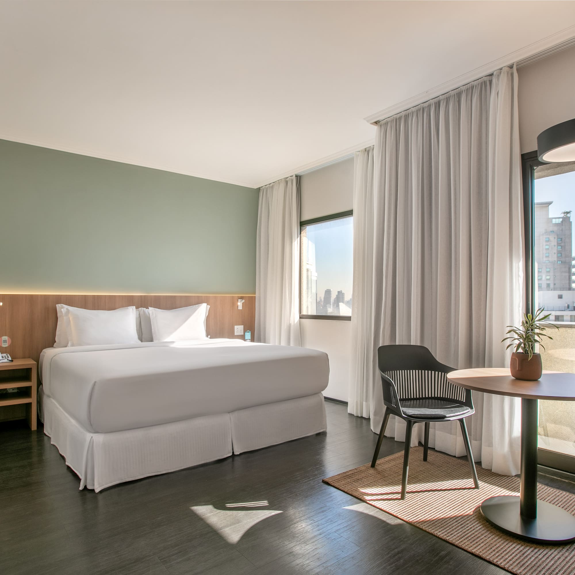 a room with a bed and a table