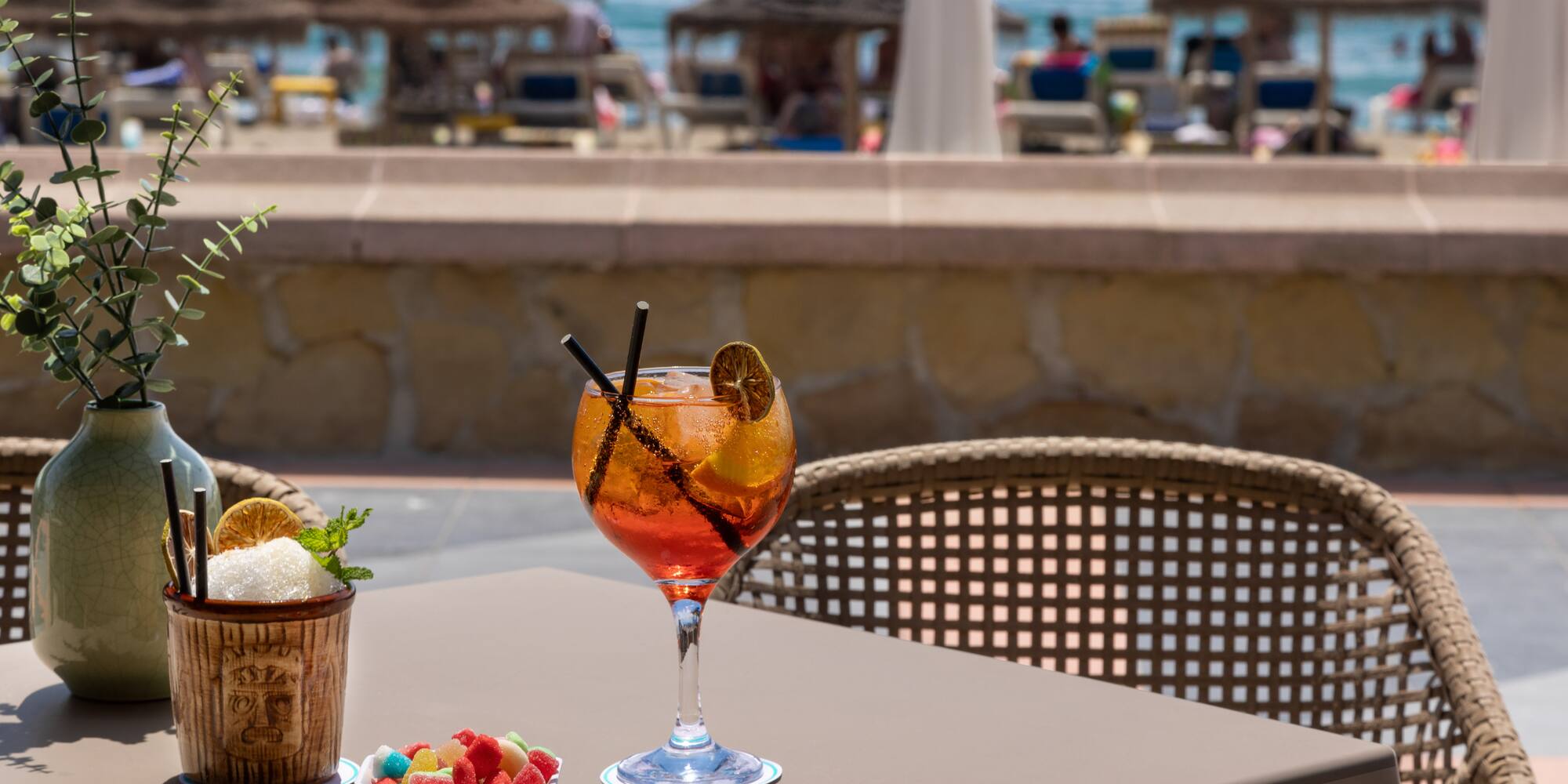 a glass of drink on a table
