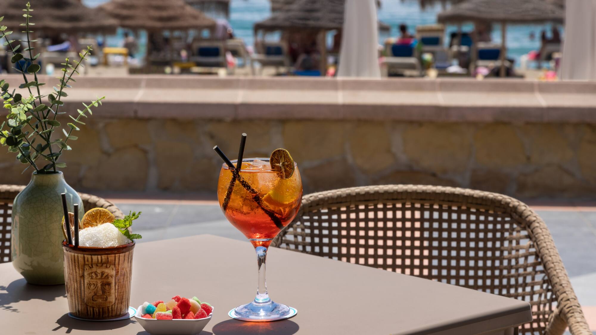 a glass of drink on a table