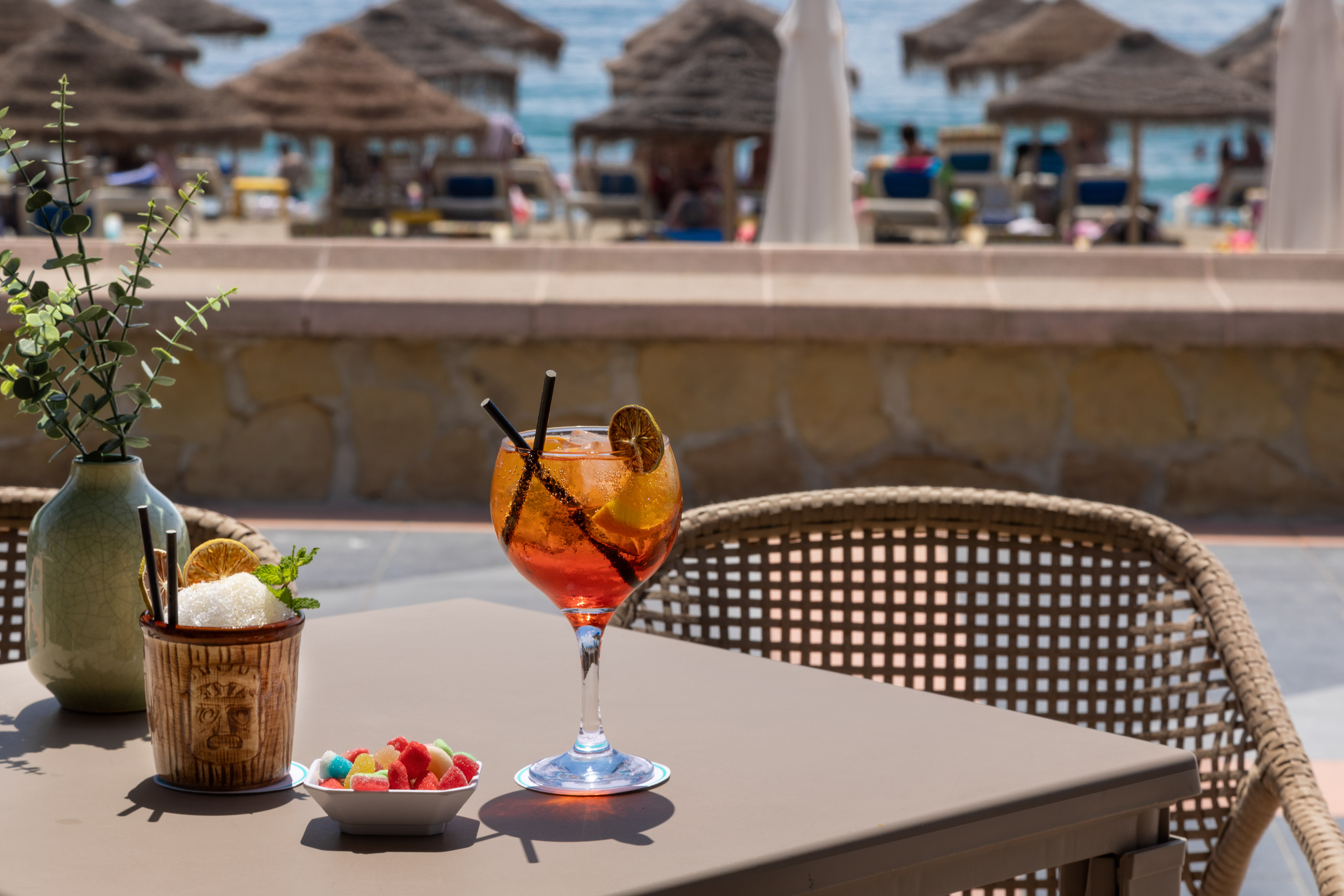 a glass of drink on a table