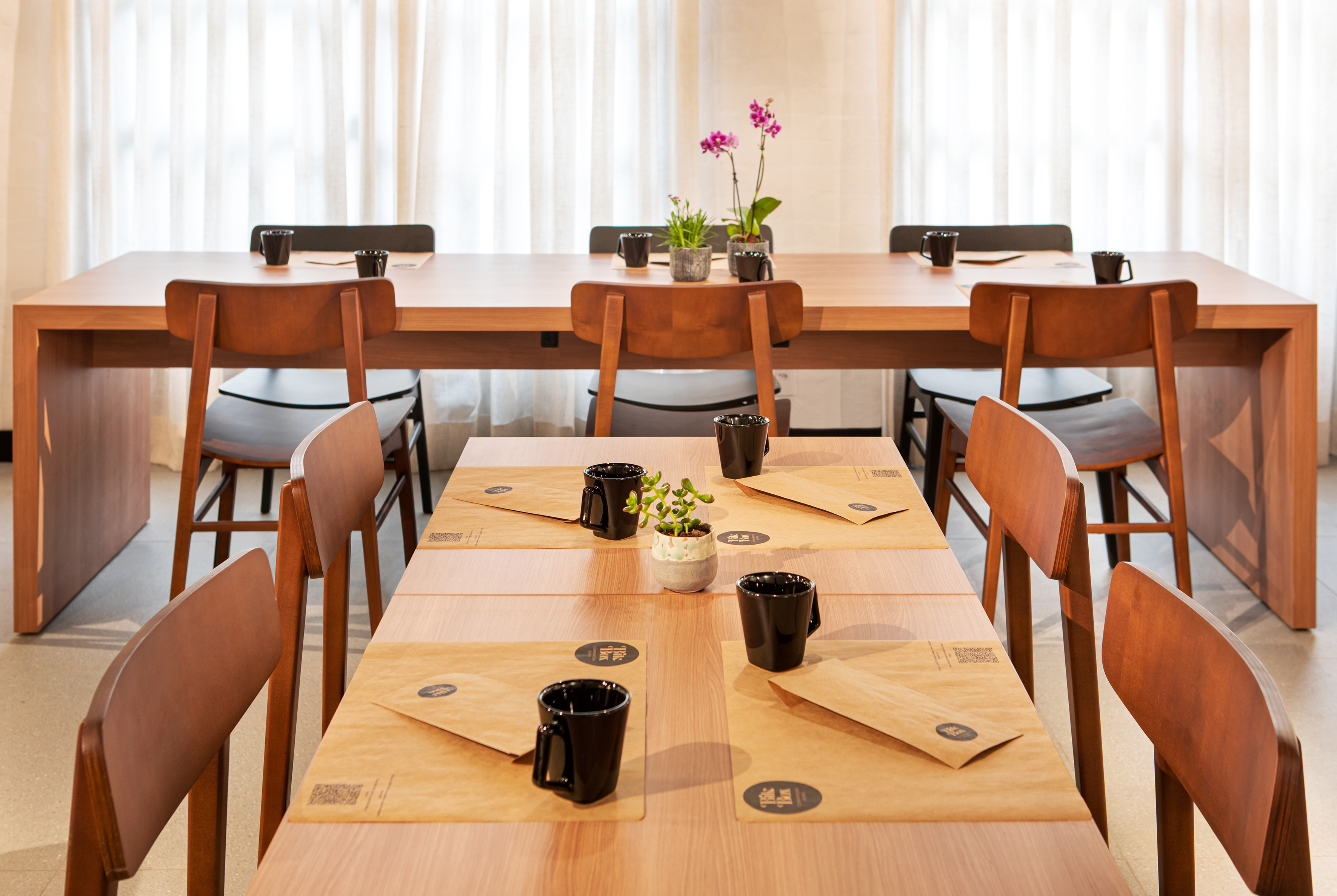 a table with black cups on it