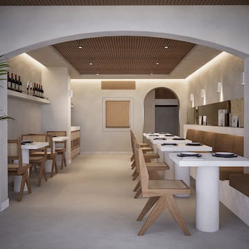 a restaurant with tables and chairs